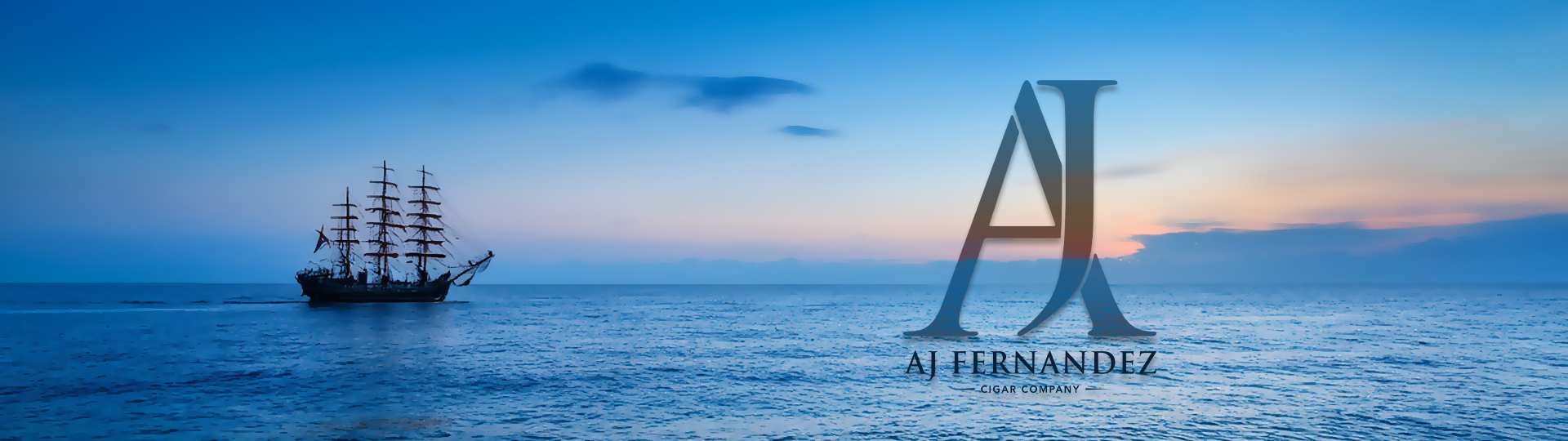 A ship at sunset with a AJ Fernandez logo overlay