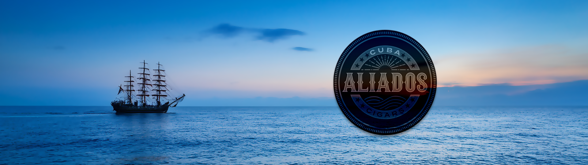 Silhouette of a tall sailing ship on a peaceful ocean at sunset with colorful sky, featuring the Cuba Aliados logo overlay.
