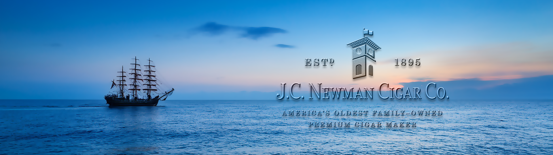 Silhouette of a tall sailing ship on a peaceful ocean at sunset with colorful sky, featuring the J.C. Newman logo overlay.