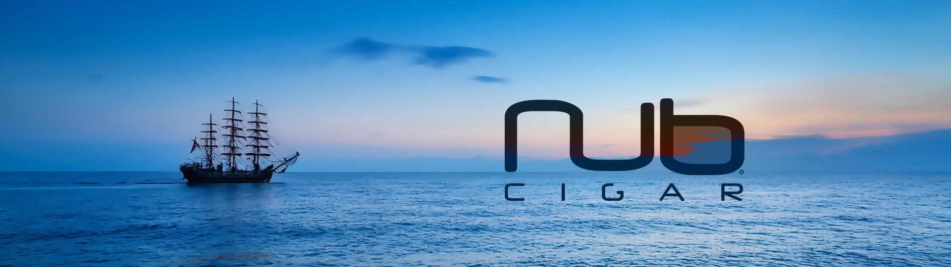 Silhouette of a tall sailing ship on a peaceful ocean at sunset with colorful sky, featuring the Nub logo overlay.
