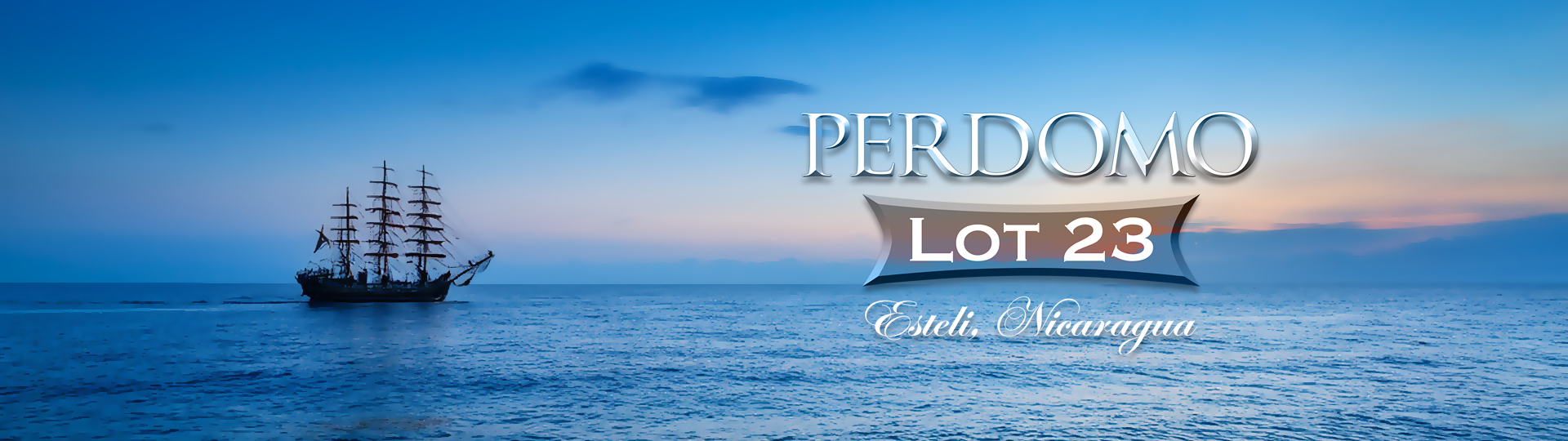 Silhouette of a tall sailing ship on a peaceful ocean at sunset with colorful sky, featuring the Lot 23 logo overlay.