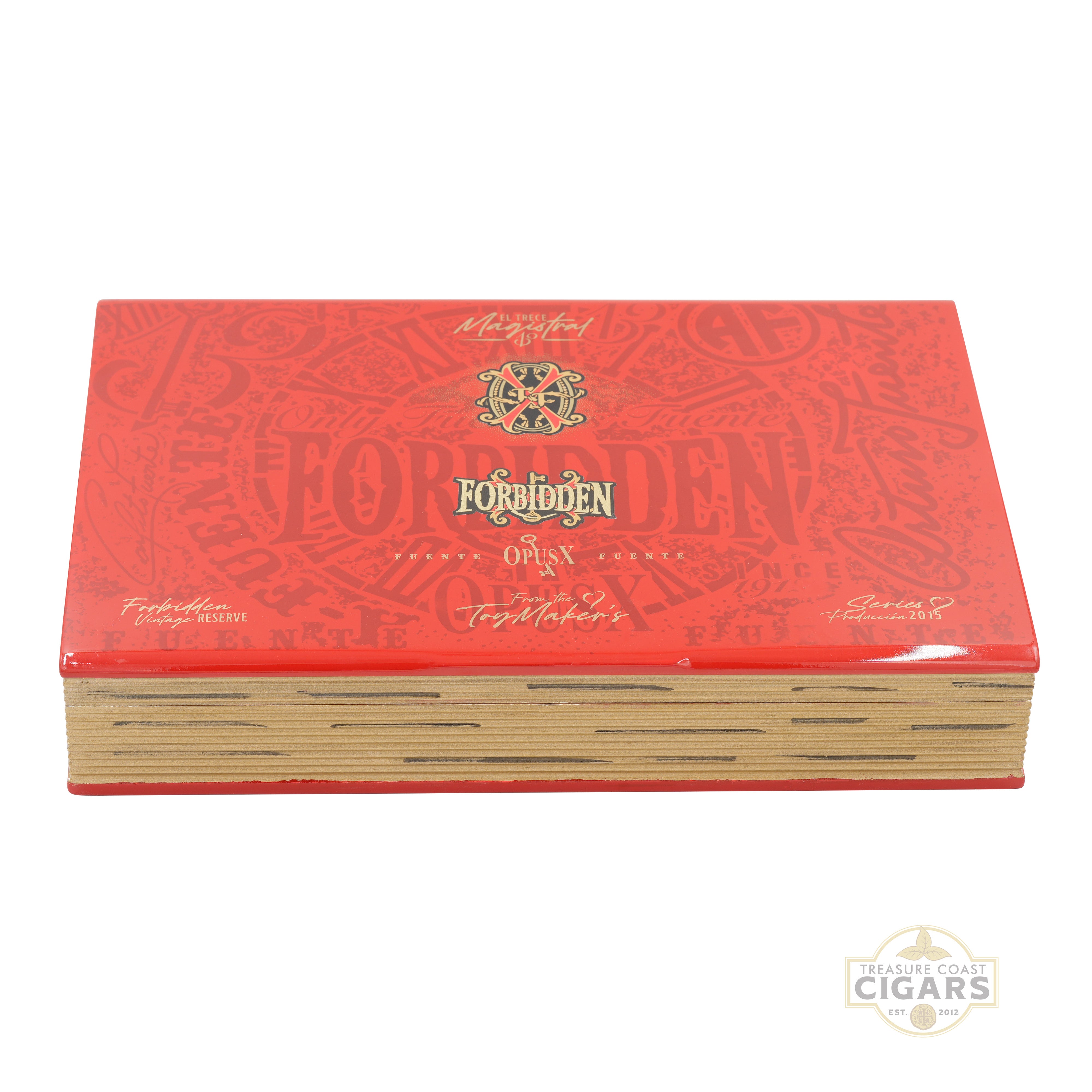 Red Forbidden cigars box with gold text and logo on a white background