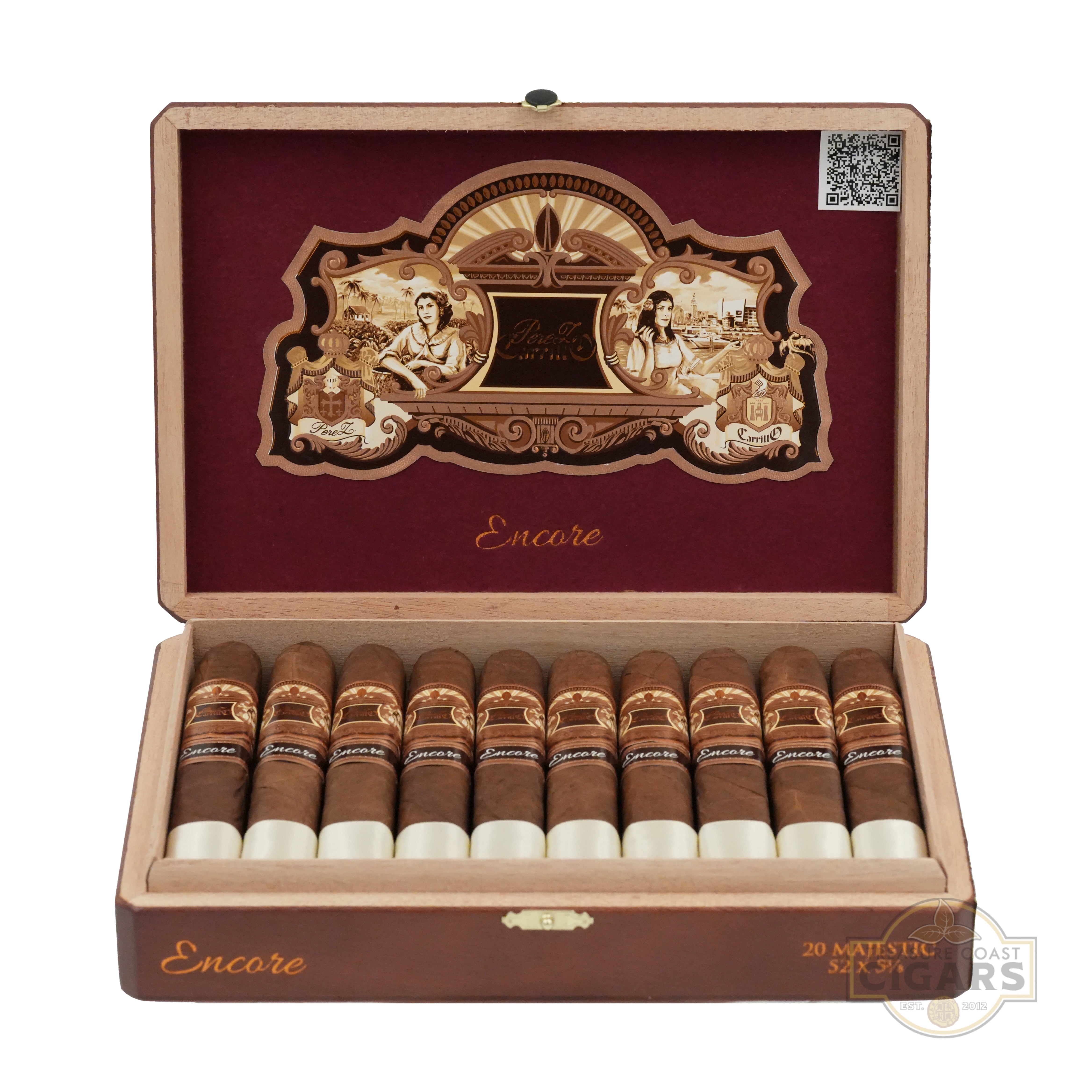 A luxurious wooden cigar box labeled "Encore" is open, revealing 20 Majestic cigars neatly arranged inside. The interior features an ornate design with gold and black accents, including illustrations of two women and tropical scenery.