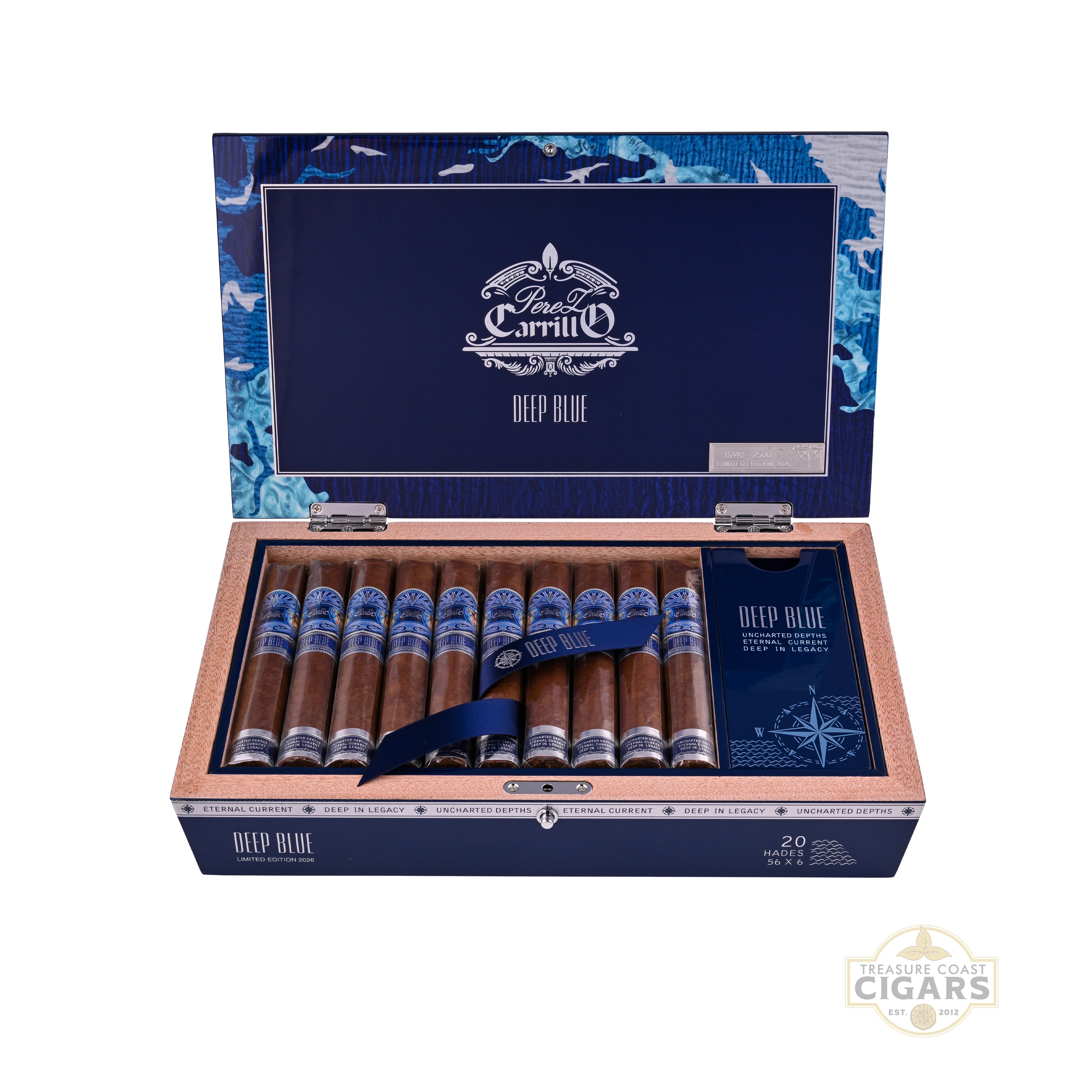 Open cigar box with Casa Carrillo Deep Blue cigars inside, featuring a blue and white design on a white background.