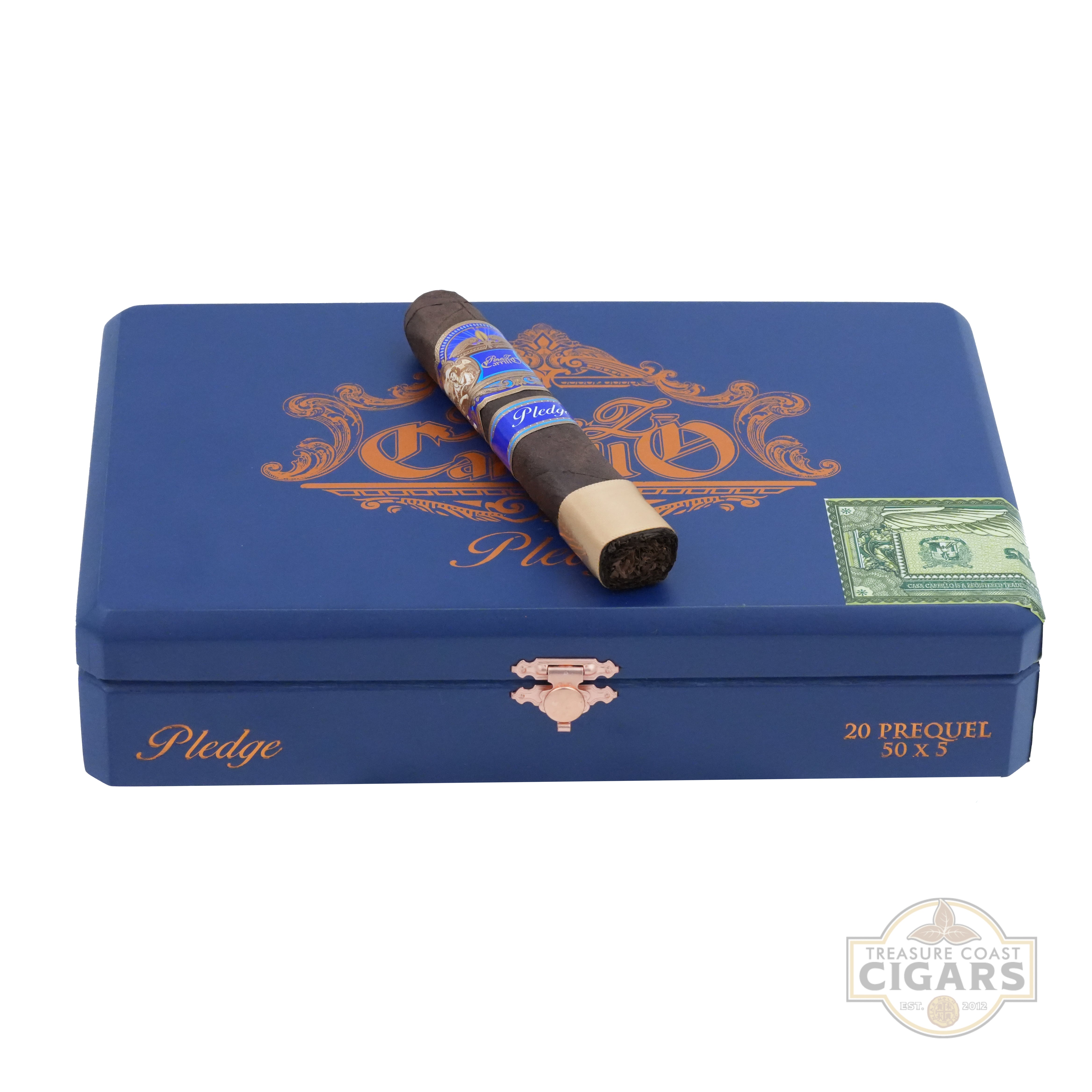 Blue Pledge cigar tin with a single unlit cigar on a white background