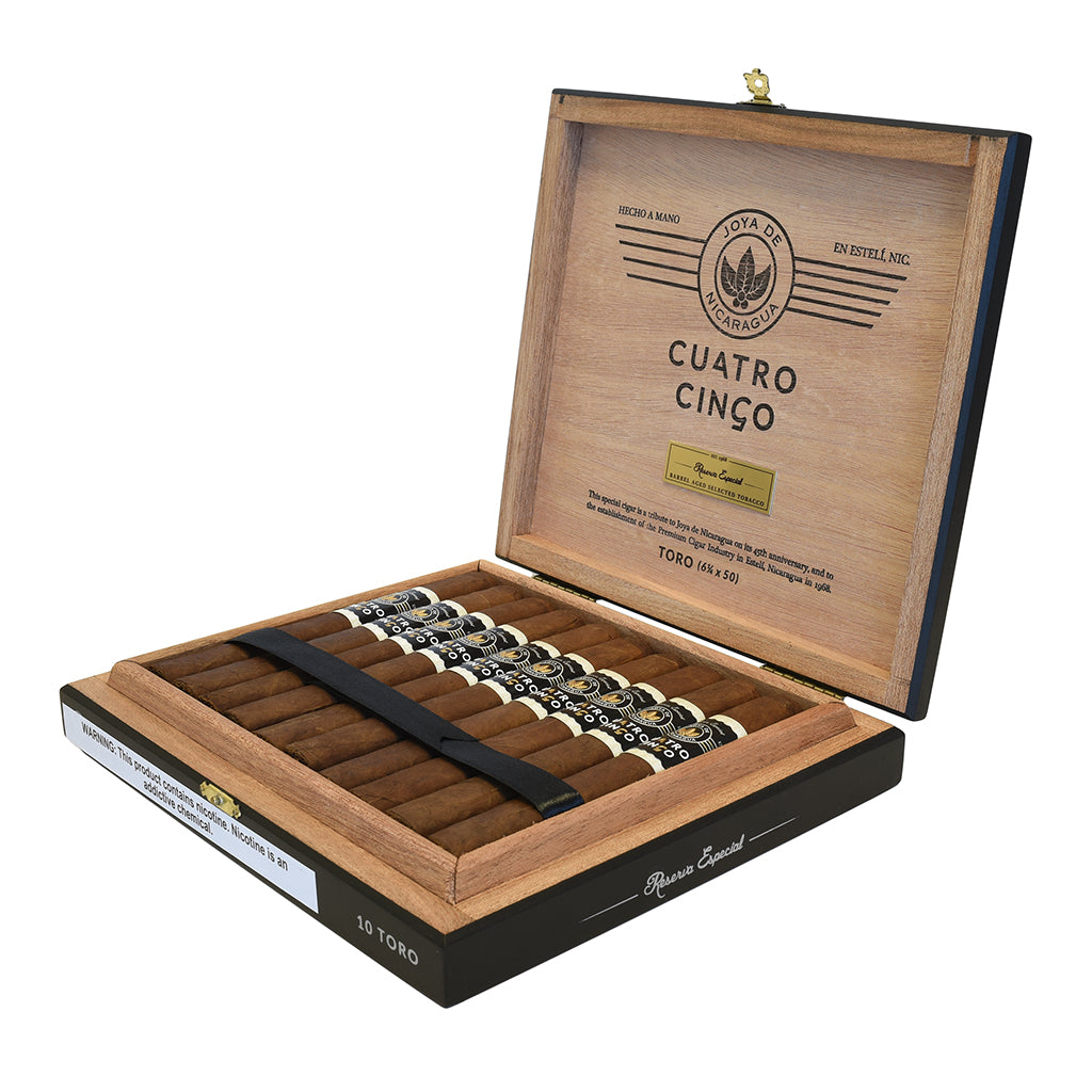 Open wooden Joya de Nicaragua Cuatro Cinco Toro cigar box with cigars inside on a white background