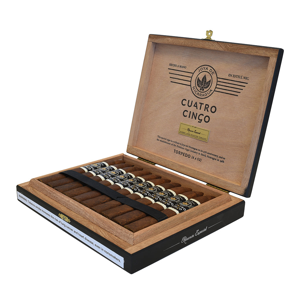 Open wooden Joya de Nicaragua Cuatro Cinco Torpedo cigar box with cigars inside on a white background