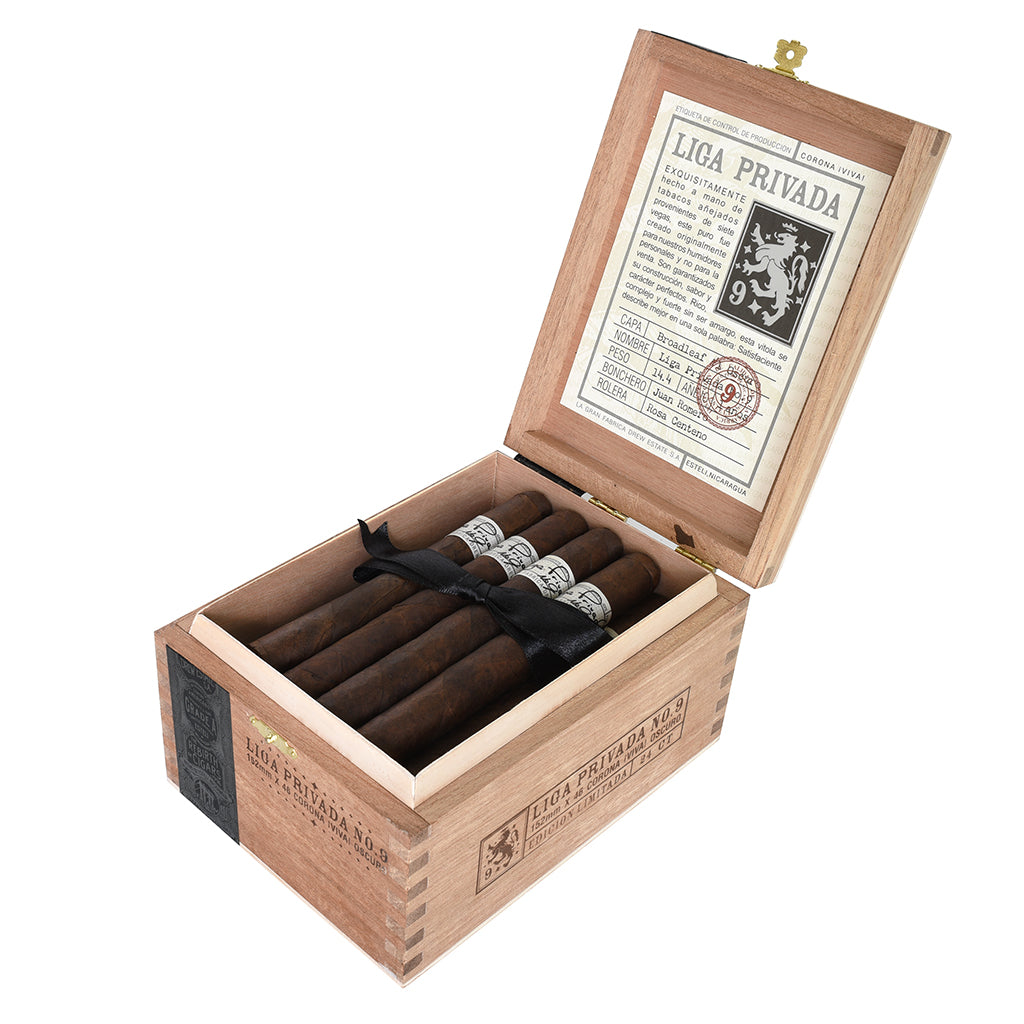 Wooden box of Liga Privada cigars with a visible brand label on a white background