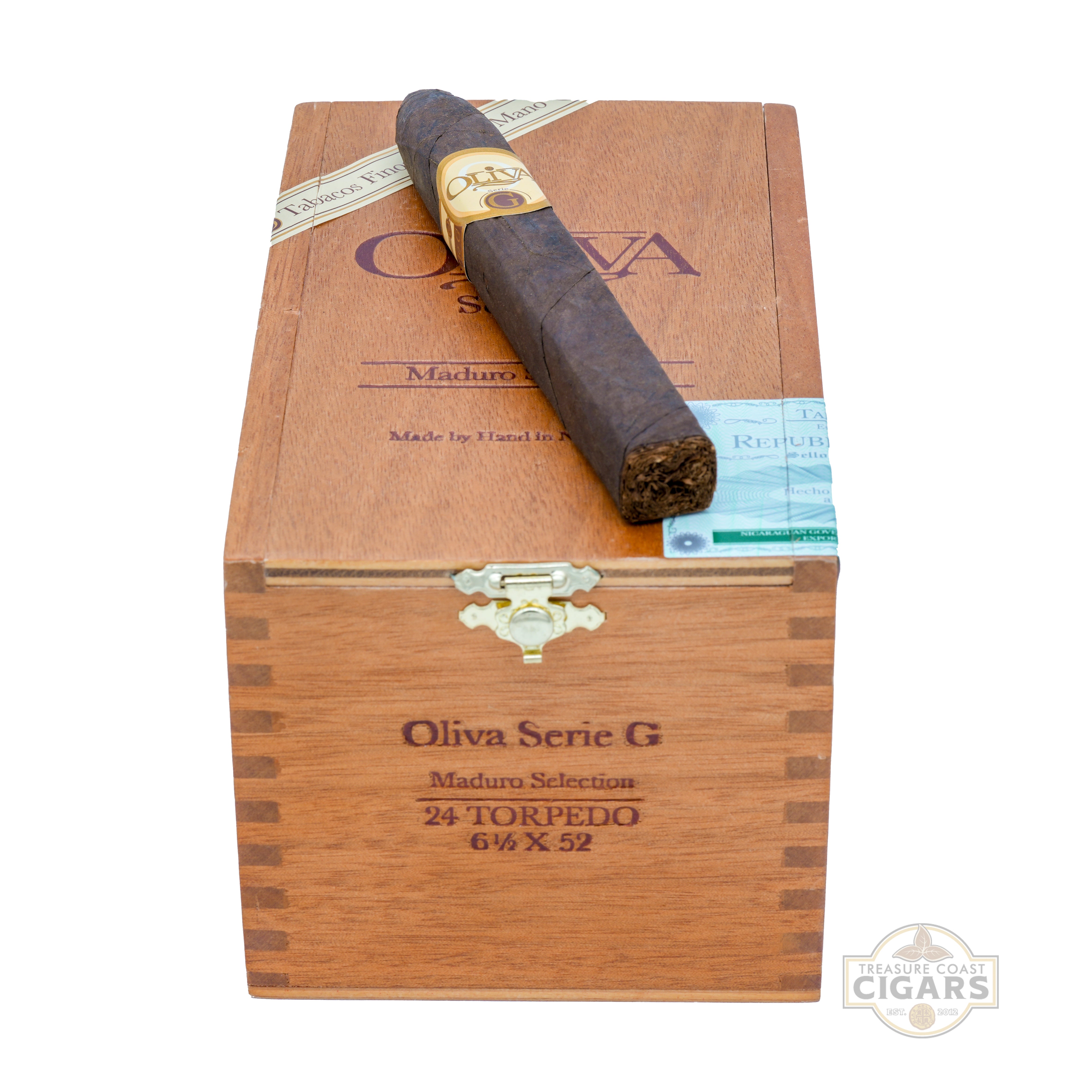 Cigar box with a cigar on top on a white background