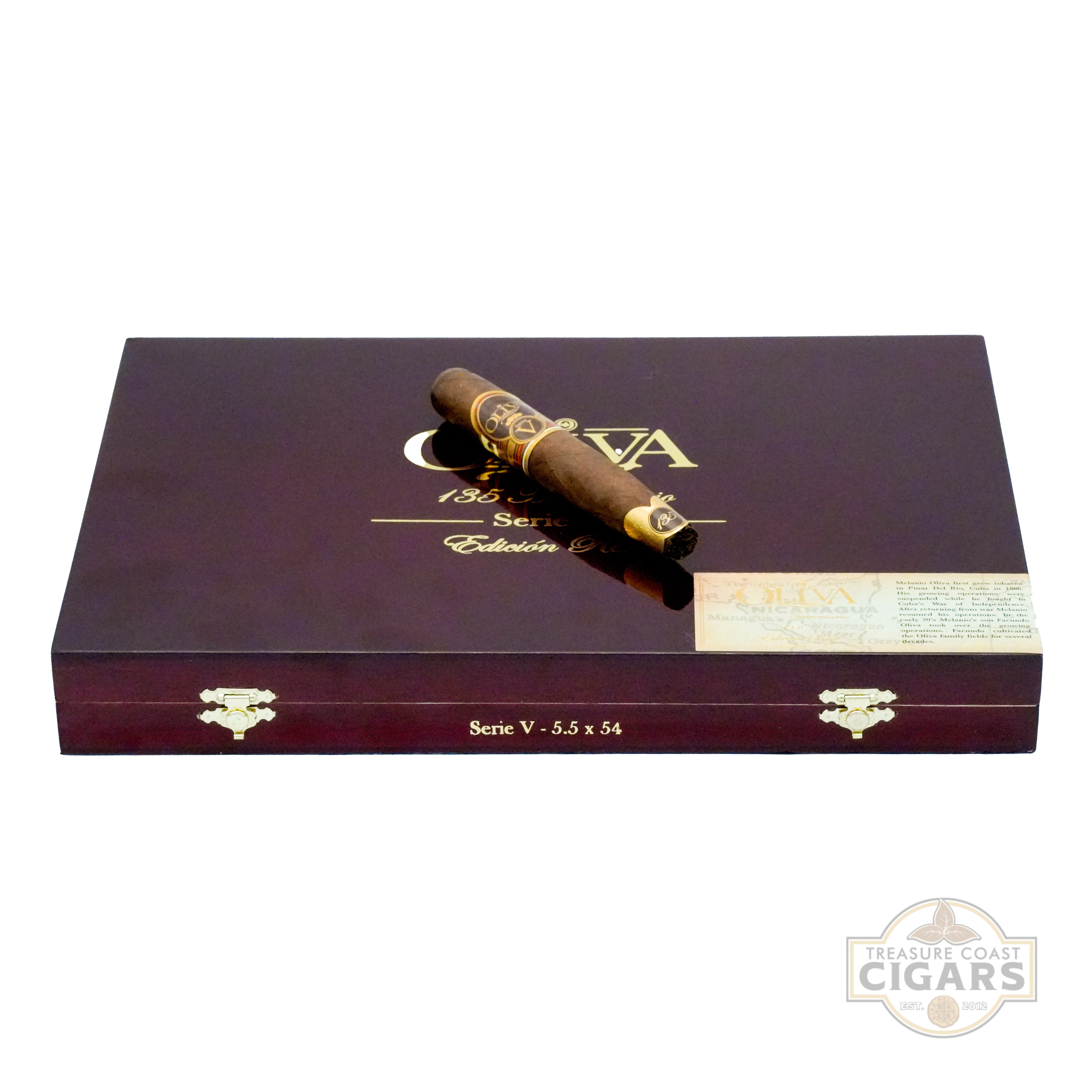 Cigar box with a cigar on top, featuring the brand 'Treasure Coast Cigars'.
