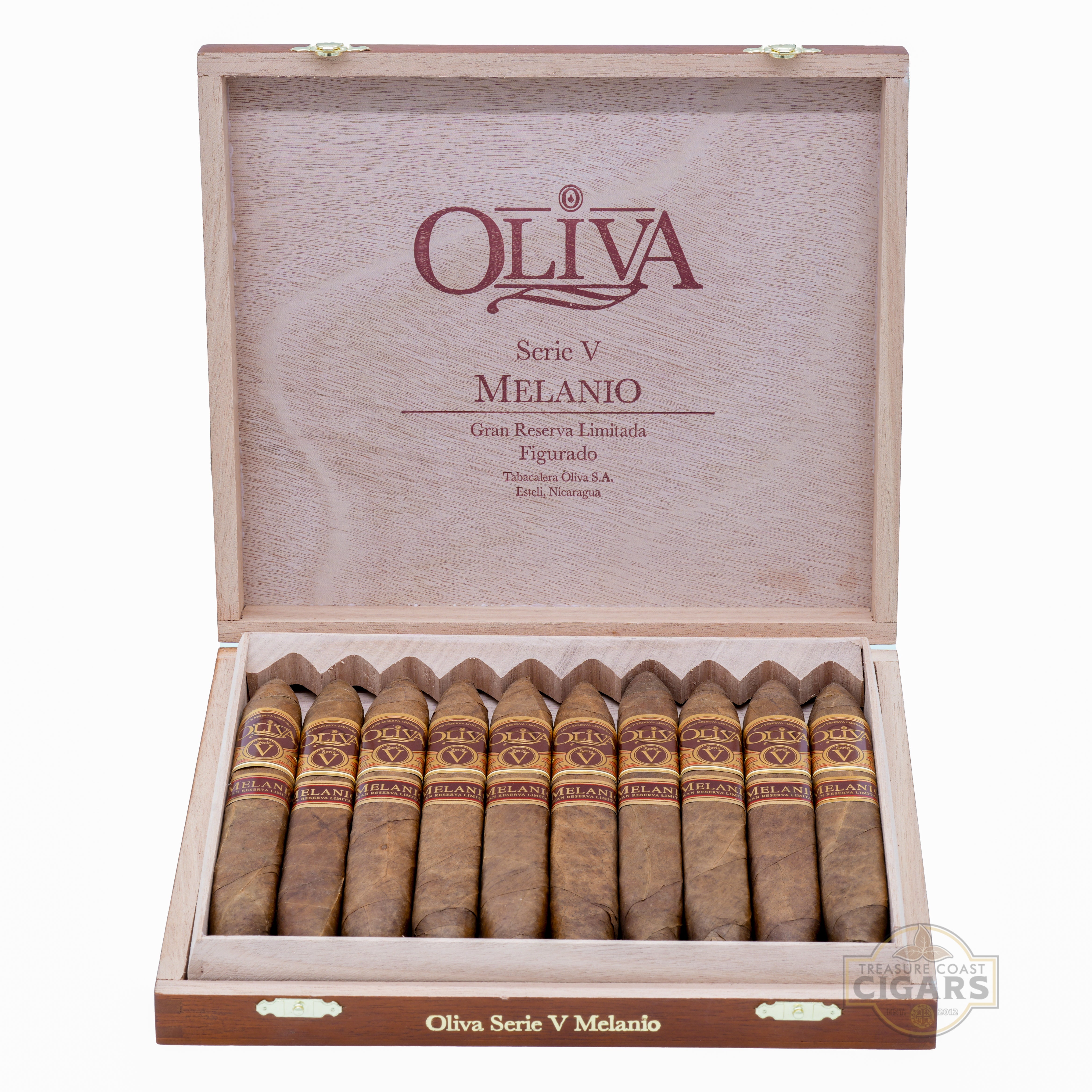 Open wooden box of Oliva Serie V Melanio Figurado cigars on a white background