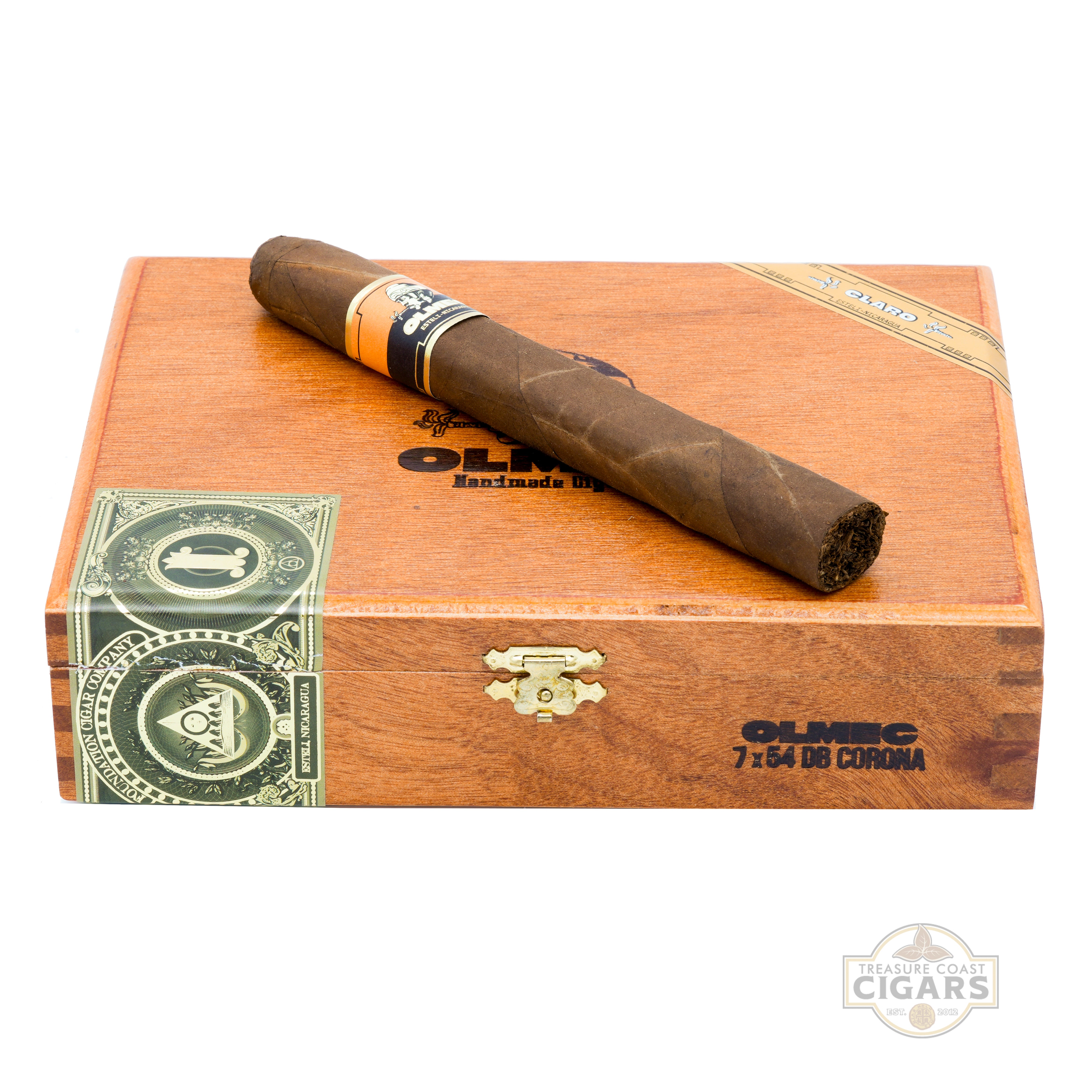 Cigar on top of a wooden Olmec cigar box with visible branding.