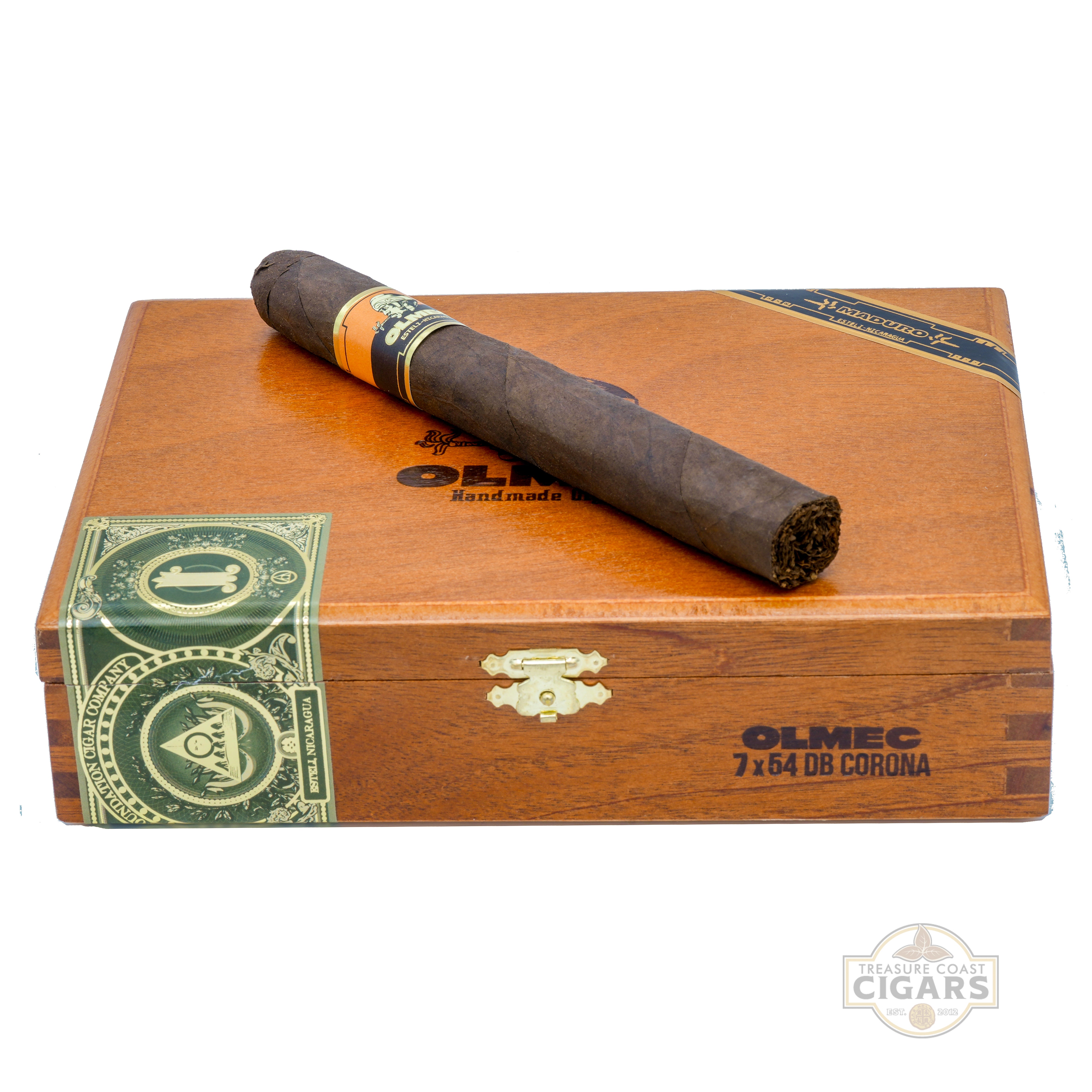 Cigar on top of a wooden Olmec cigar box with visible branding.