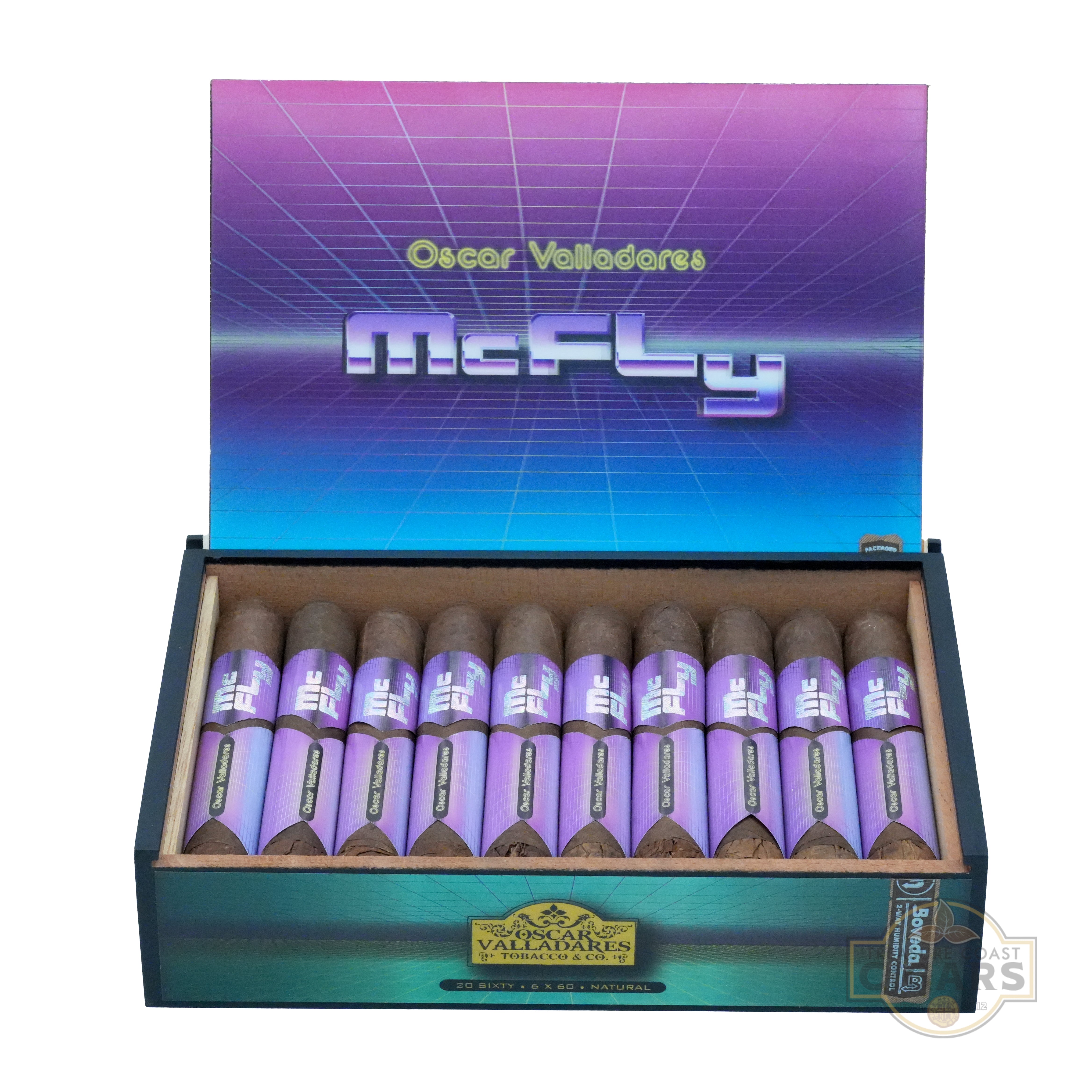 A box of McFly cigars by Oscar Valladares, featuring a vibrant retro design with purple and blue gradients and a grid pattern on the lid. The box contains 20 cigars wrapped in purple bands with the "McFly" logo, neatly arranged in two rows. The brand name "Oscar Valladares Tobacco Company" are displayed on a yellow label at the bottom of the box, with additional text indicating "20 SIXTY 6 x 60 NATURAL."