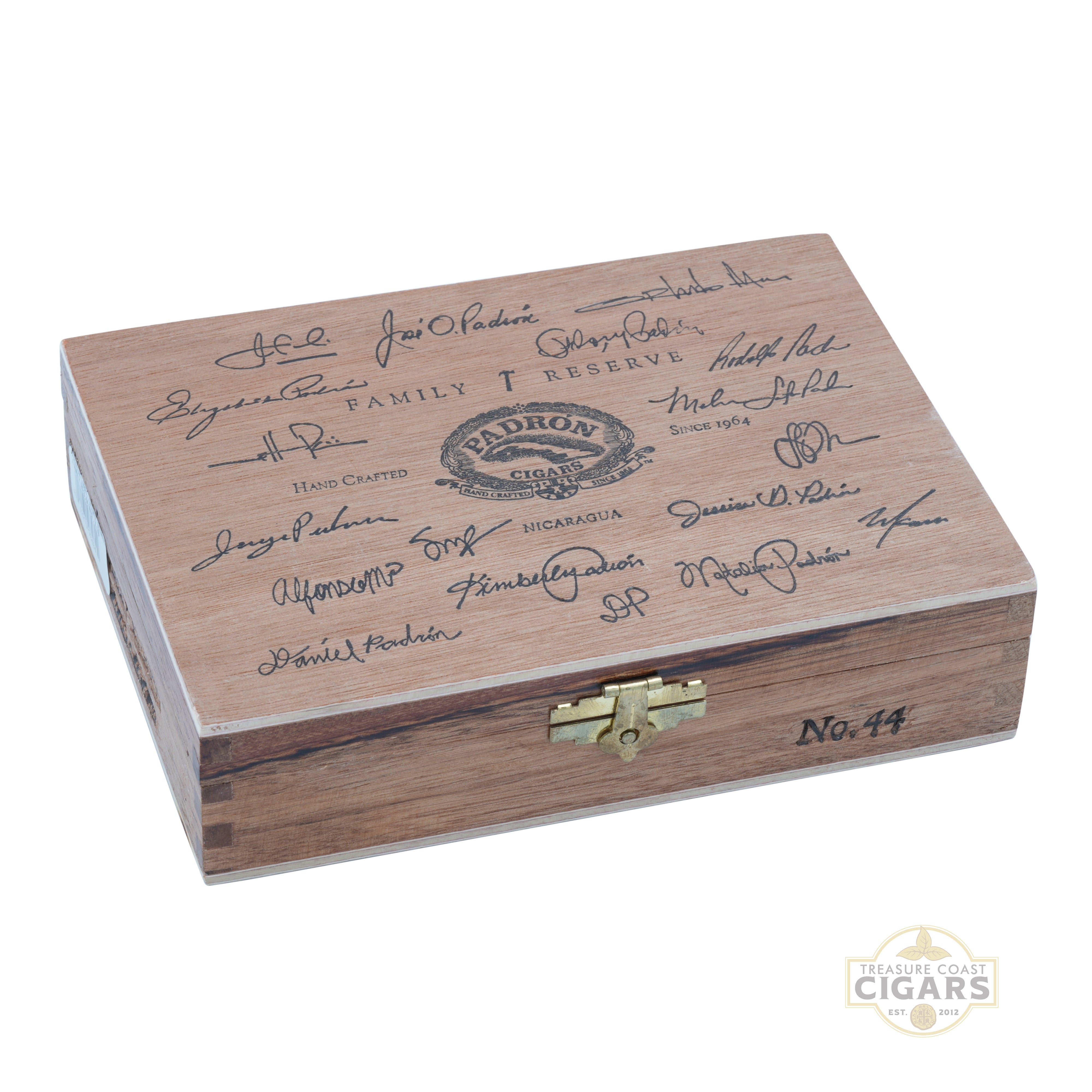 Wooden Padron Family Reserve cigar box with signatures and brand logo on a white background