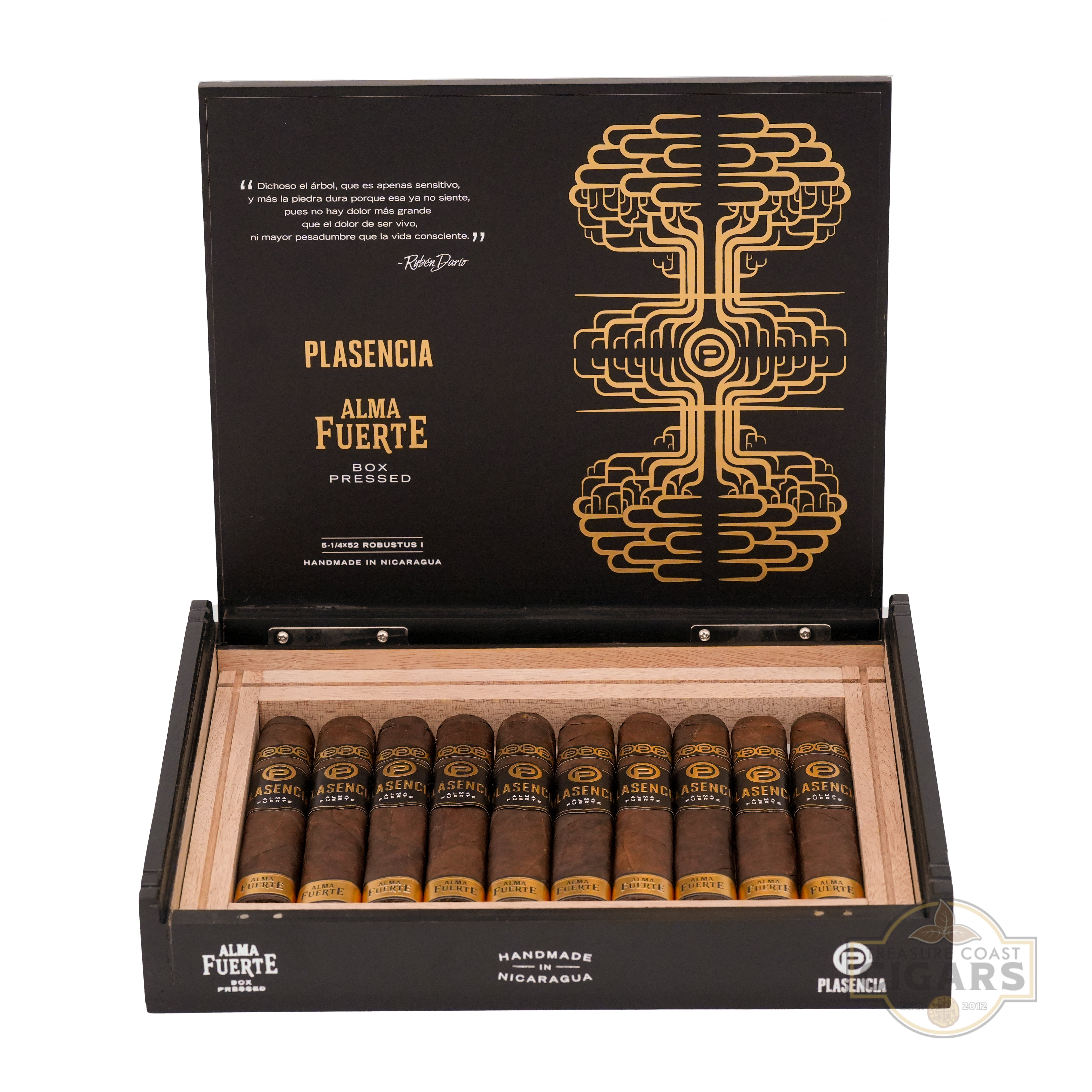 An open cigar box labeled "Alma Fuerte Box Pressed" by Plasencia, featuring a striking black interior with intricate gold geometric artwork on the lid. The box contains a row of premium cigars, each with a black and gold band, handcrafted in Nicaragua as indicated on the label. Additional text on the lid includes a quote from Ruben Dario and the Robusto size (5.25 x 52).