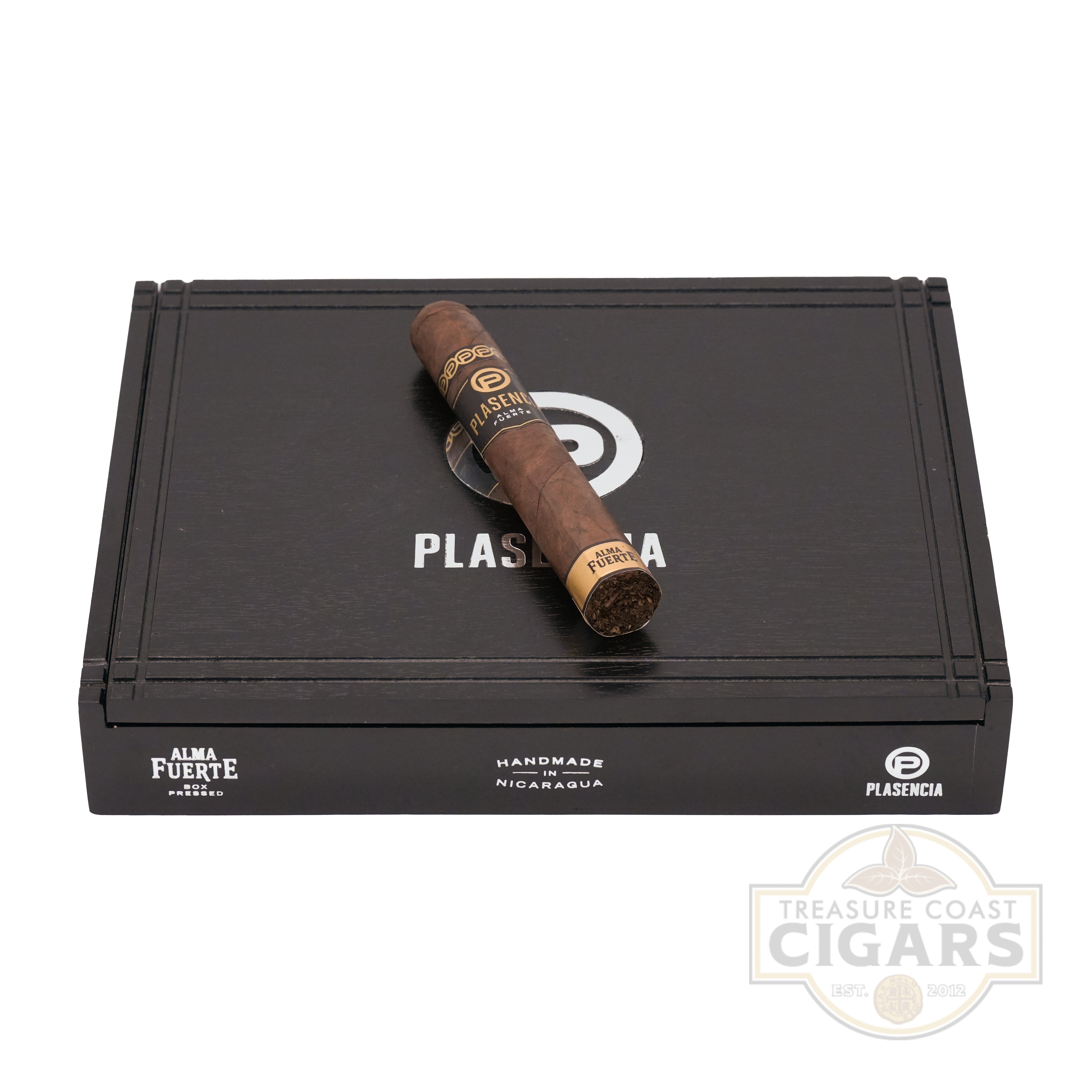 Cigar on a black Plasencia cigar box with visible branding.