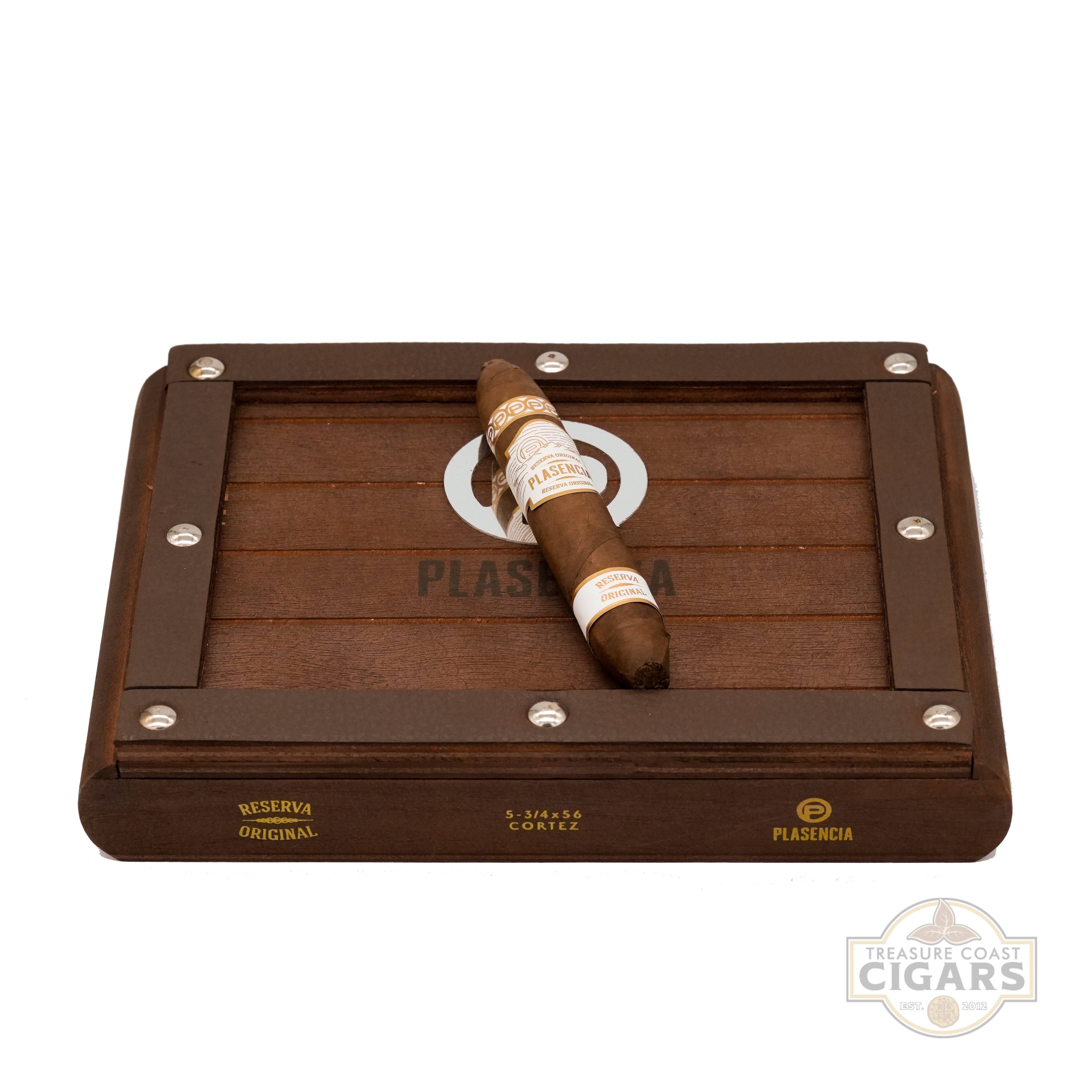 Cigar in a wooden humidor with Plasencia branding on a white background