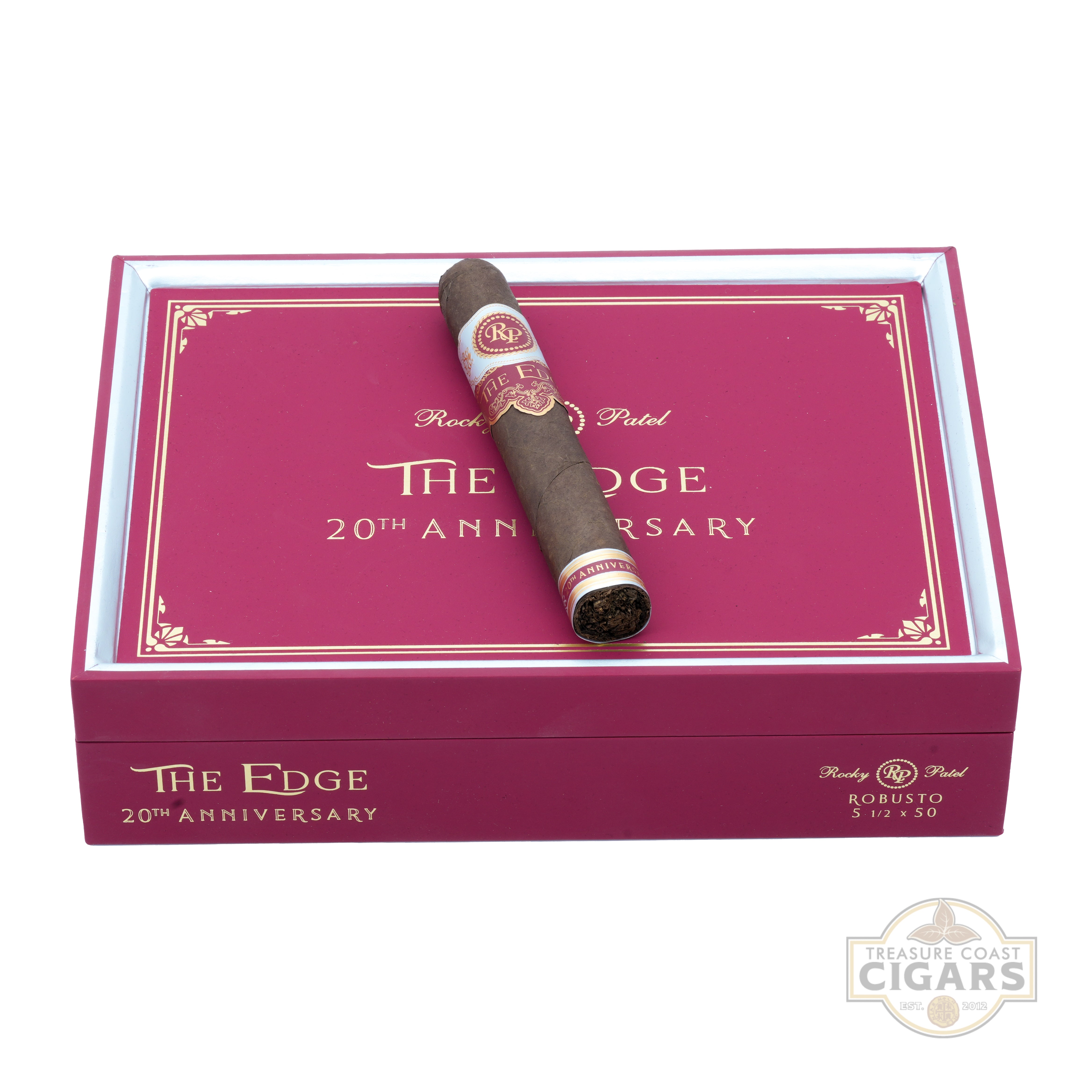 Cigar sitting on a 'The Edge 20th Anniversary' Rocky Patel box on a white background