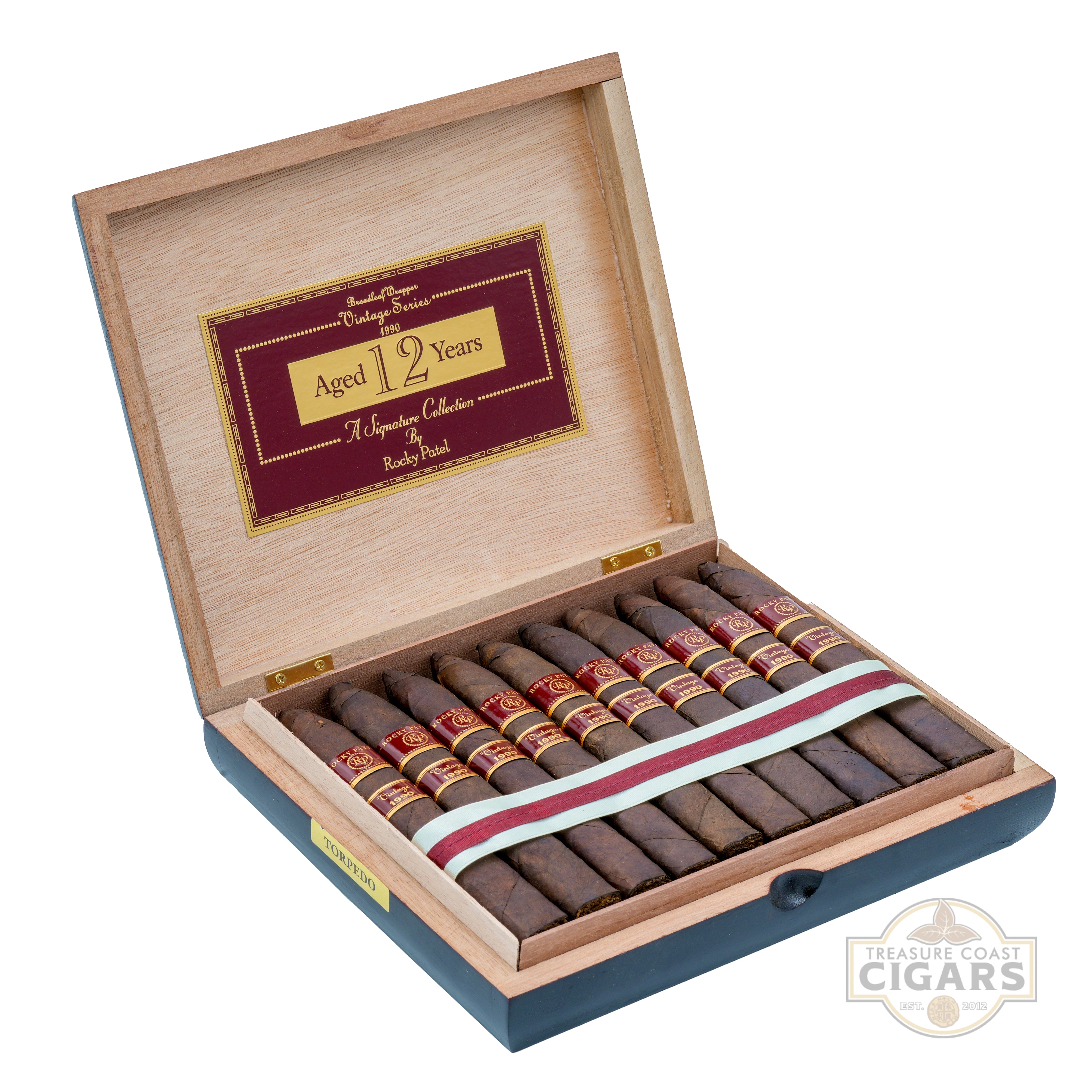 Open wooden cigar box with cigars inside on a white background