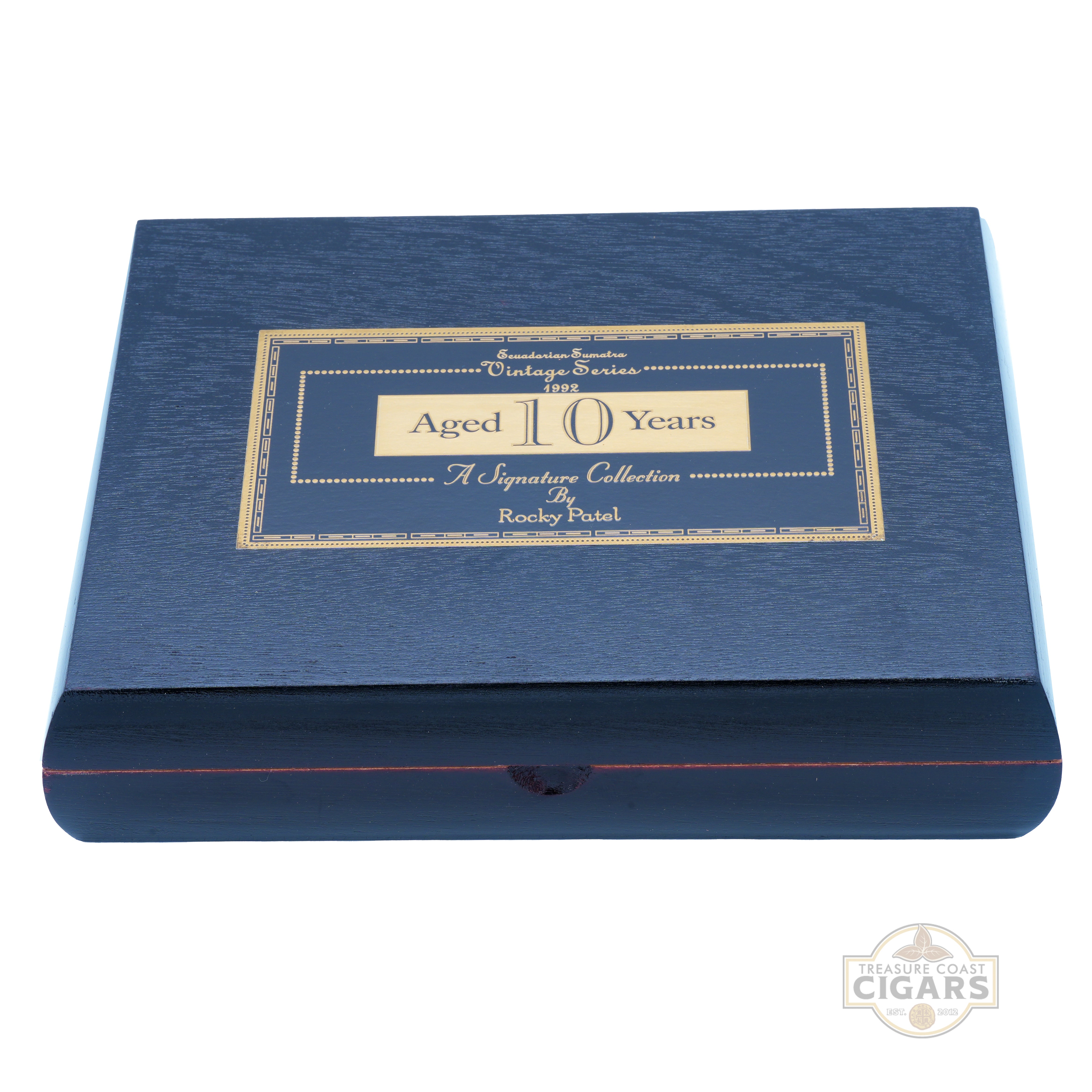 Black cigar box with gold text on a white background