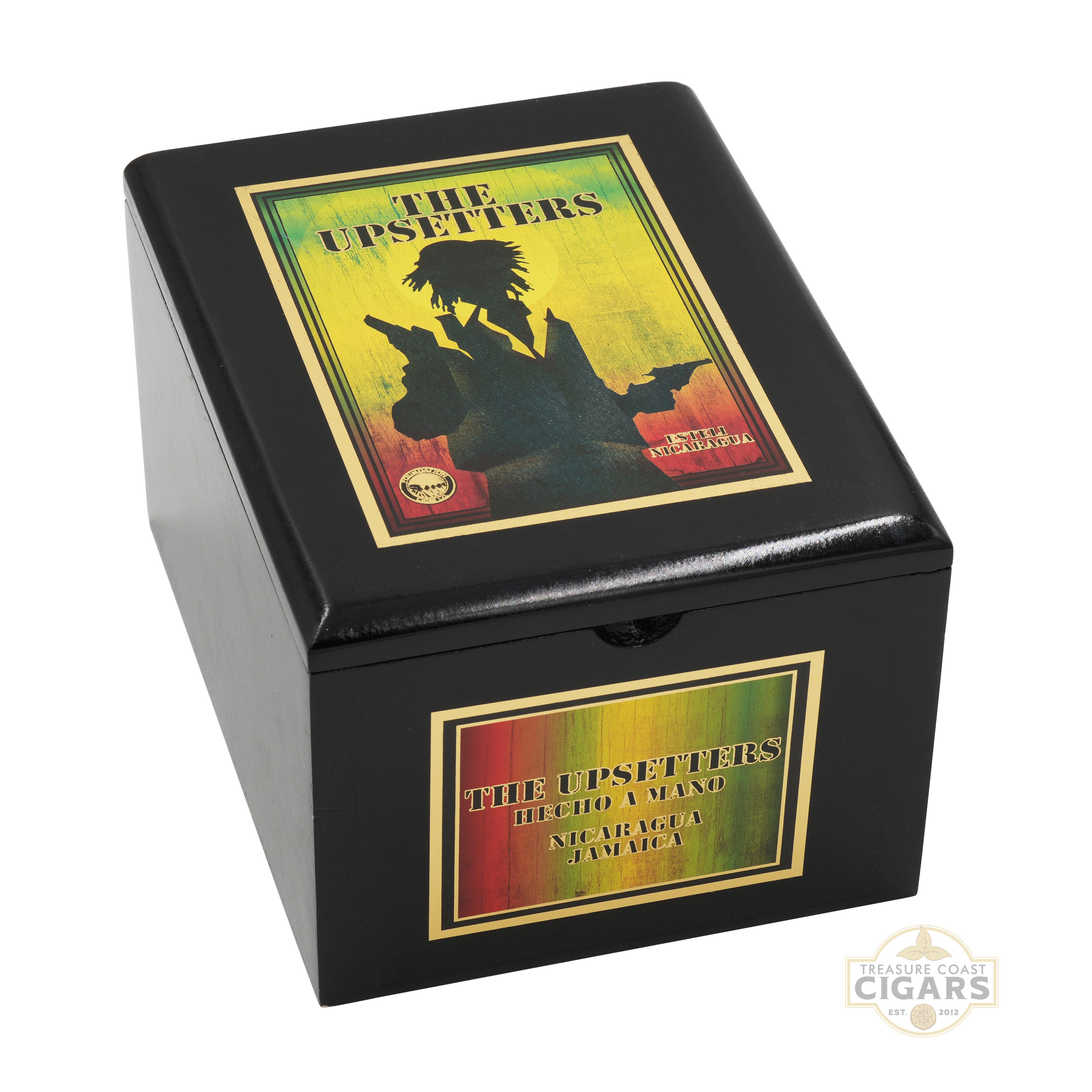 Black box with 'The Upsetters' branding and colorful design on a white background