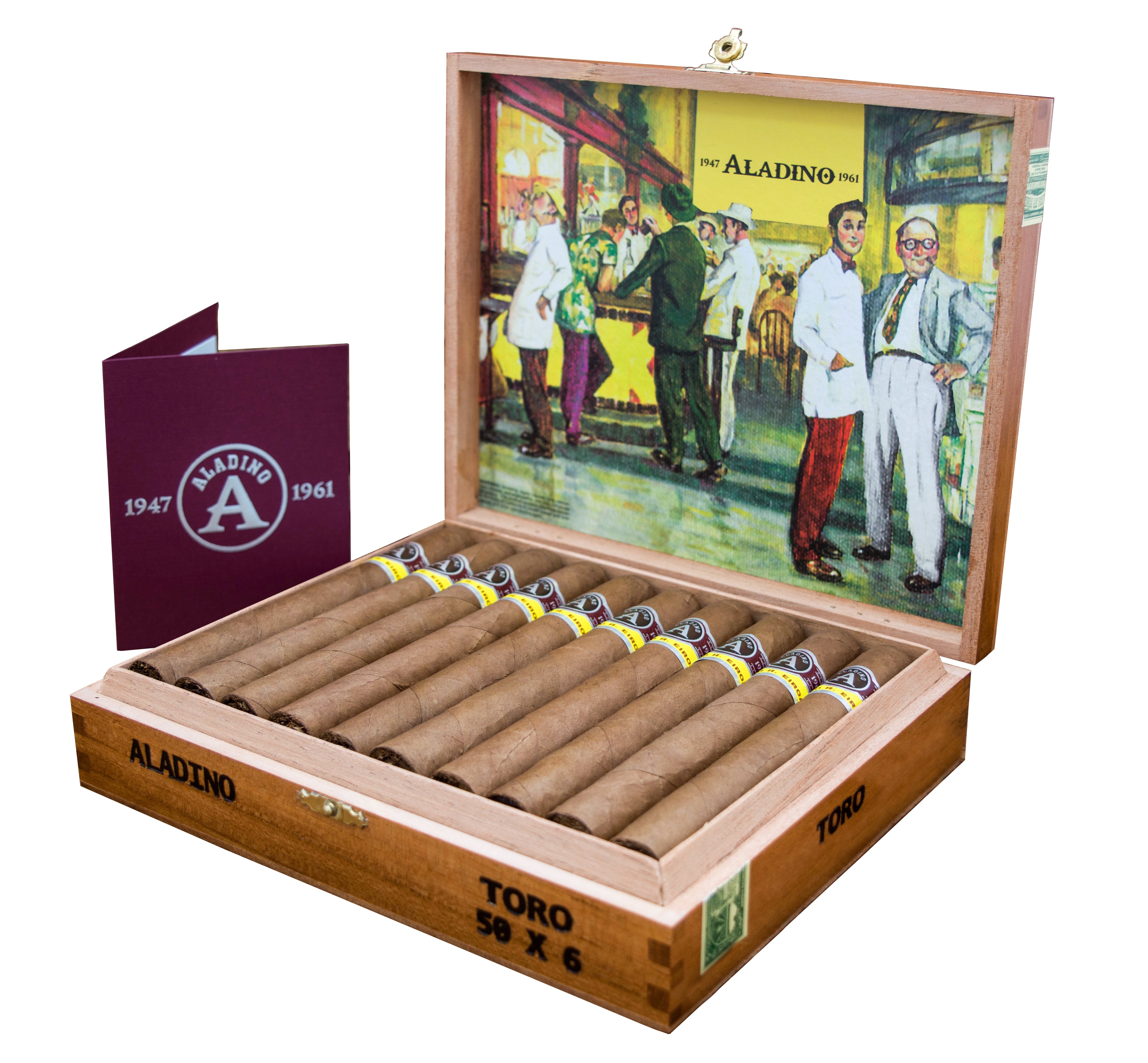 A wooden cigar box labeled "ALADINO TORO" is open, revealing a row of neatly arranged cigars with yellow and black bands. The inside lid features a colorful illustration of people in a vintage shop, with the "ALADINO 1961" logo prominently displayed. Next to the box is a maroon booklet or folder with the Aladino logo and the year "1947-1961" printed on it. 