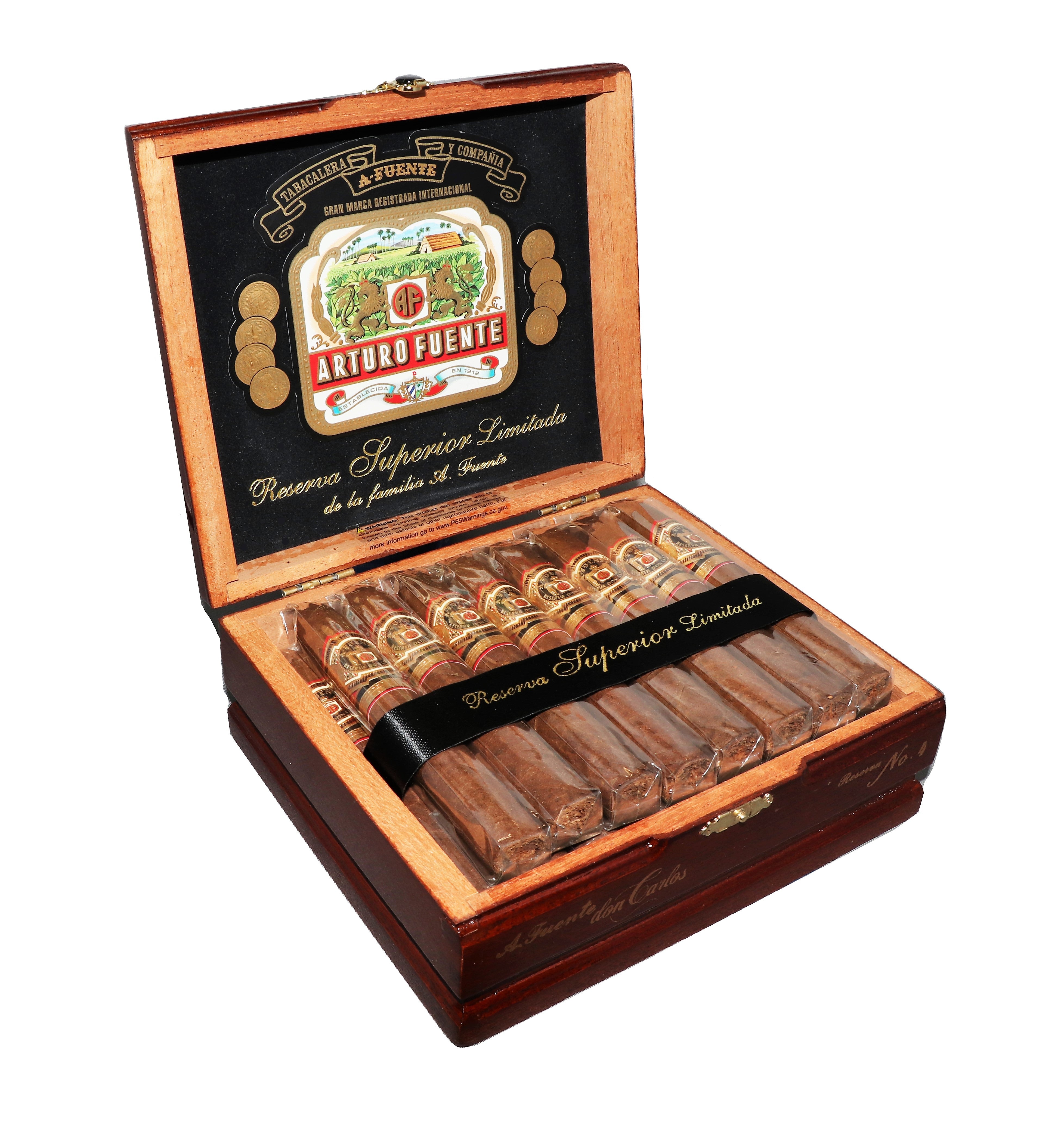 Open wooden humidor with Arturo Fuente cigars on a white background