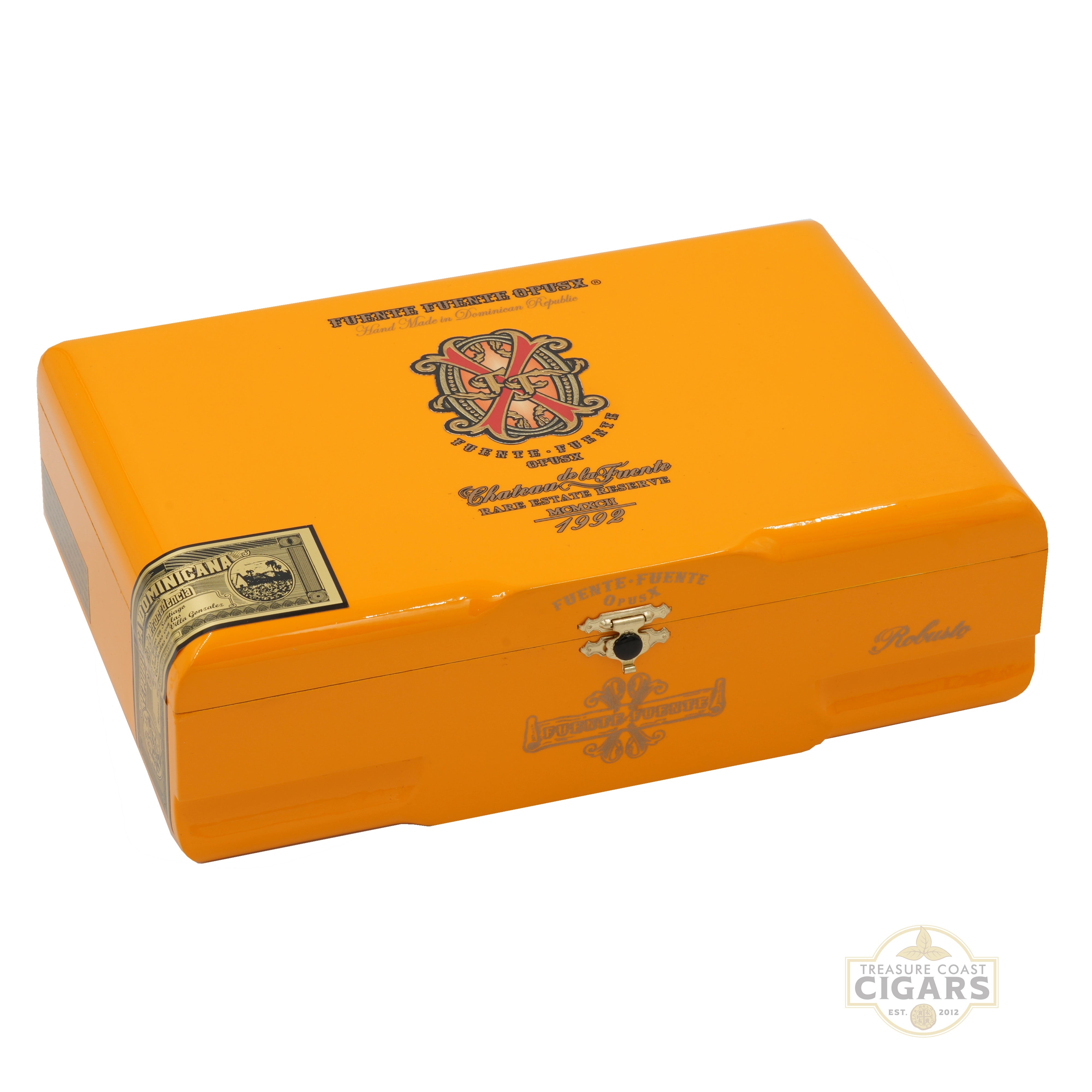 Yellow Opus X Oro cigar box with branding on a white background
