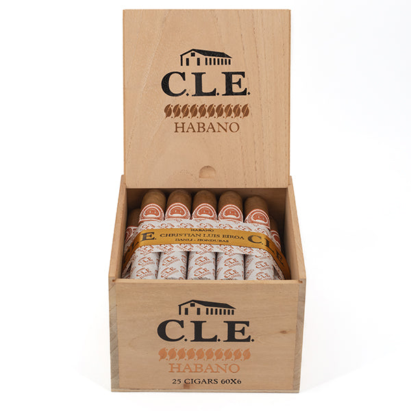 An open wooden cigar box labeled “C.L.E. Habano” on the lid and front, featuring a stylized tobacco leaf design and a small house icon. Inside, the box contains 25 cigars, each wrapped in a light brown Habano wrapper, bundled with a yellow band inscribed with “C.L.E. Christian Eiroa Habano” and “Danli Honduras.” The cigars are neatly arranged, and the box is marked “25 CIGARS 60x6” on the front