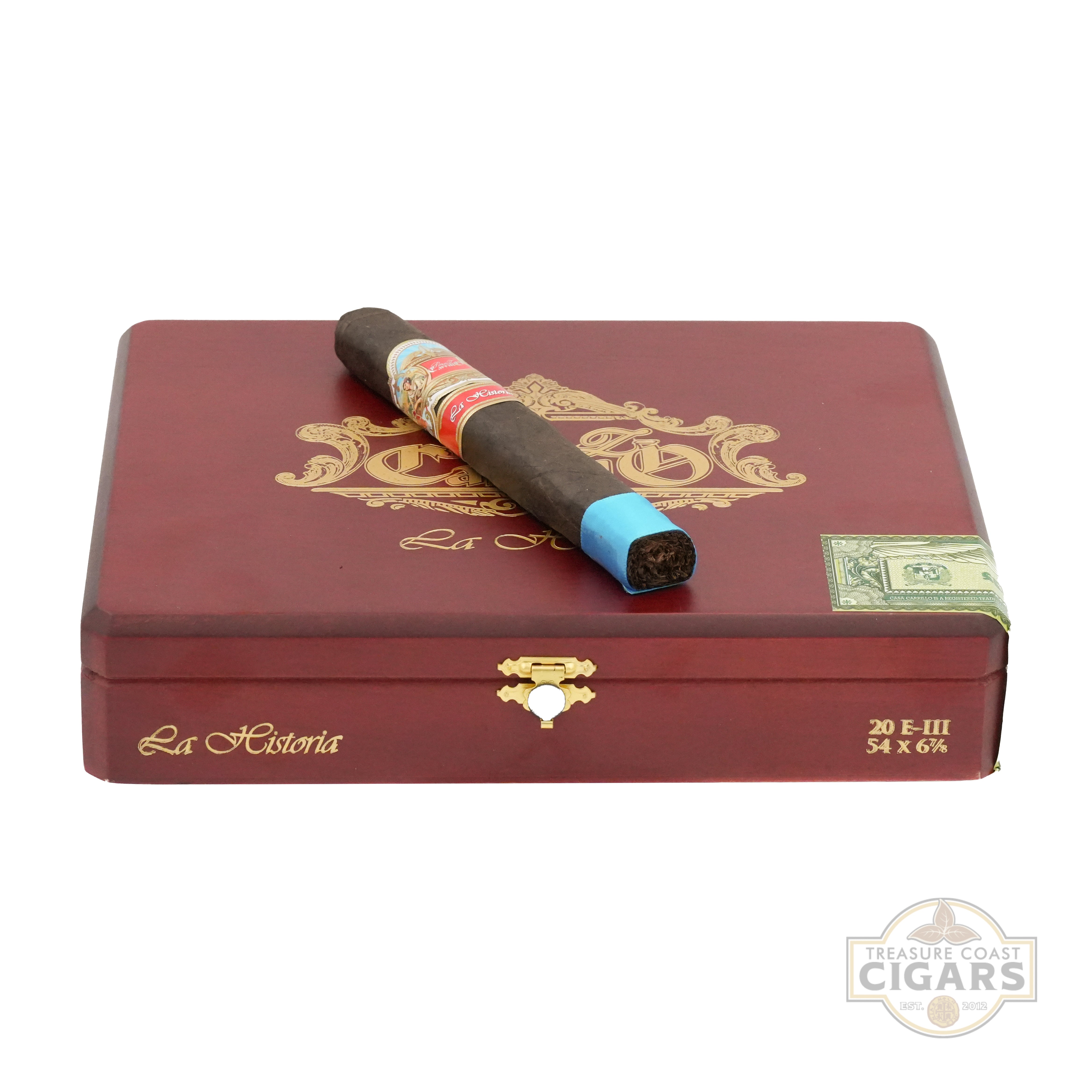 Cigar in a red La Historia box with visible branding.