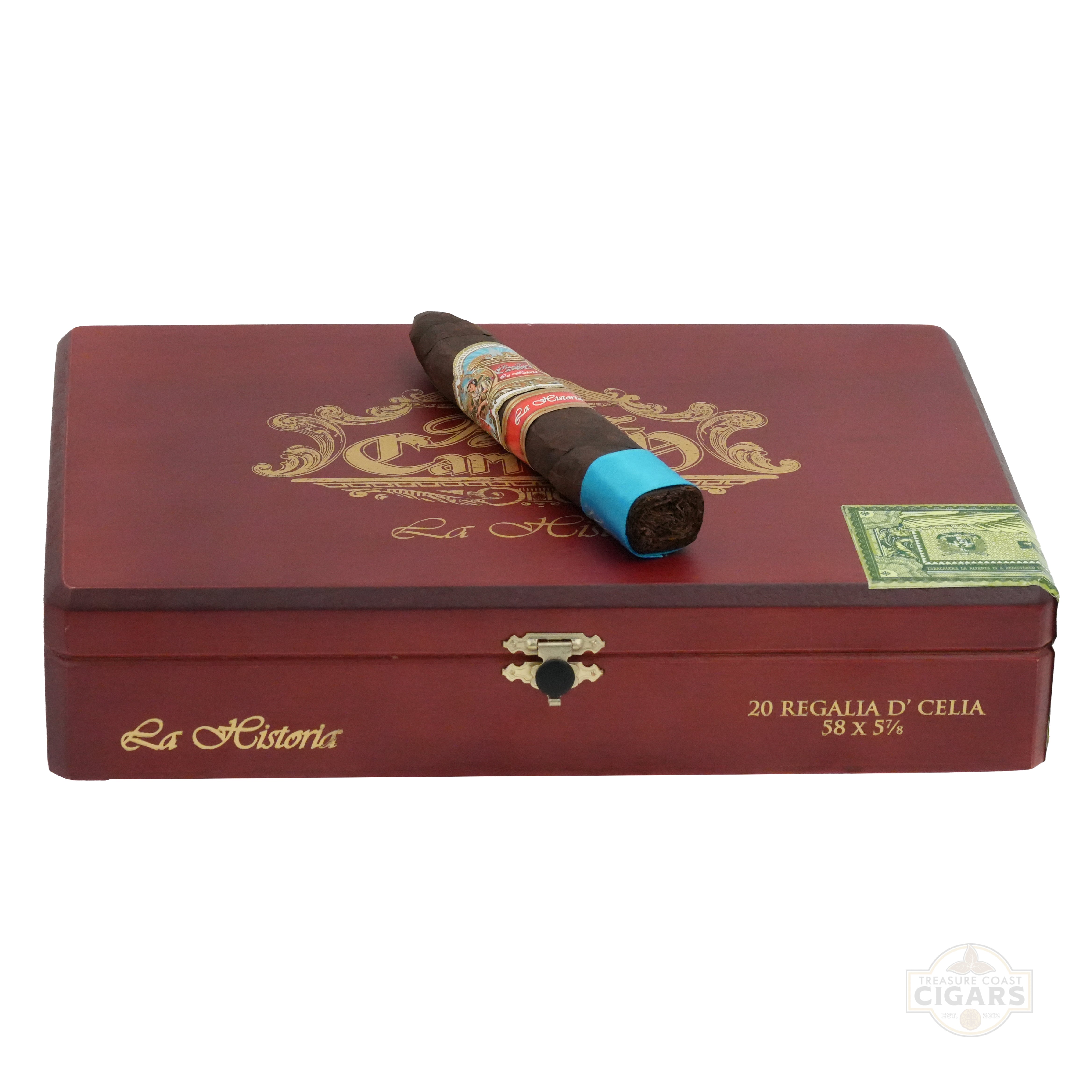 Cigar box with a rolled cigar on top, featuring 'La Historia' branding.