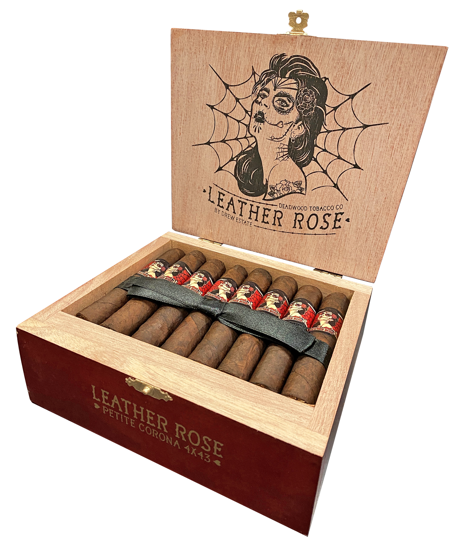 Open wooden cigar box with cigars and a decorative cover featuring a tattoo-style design.
