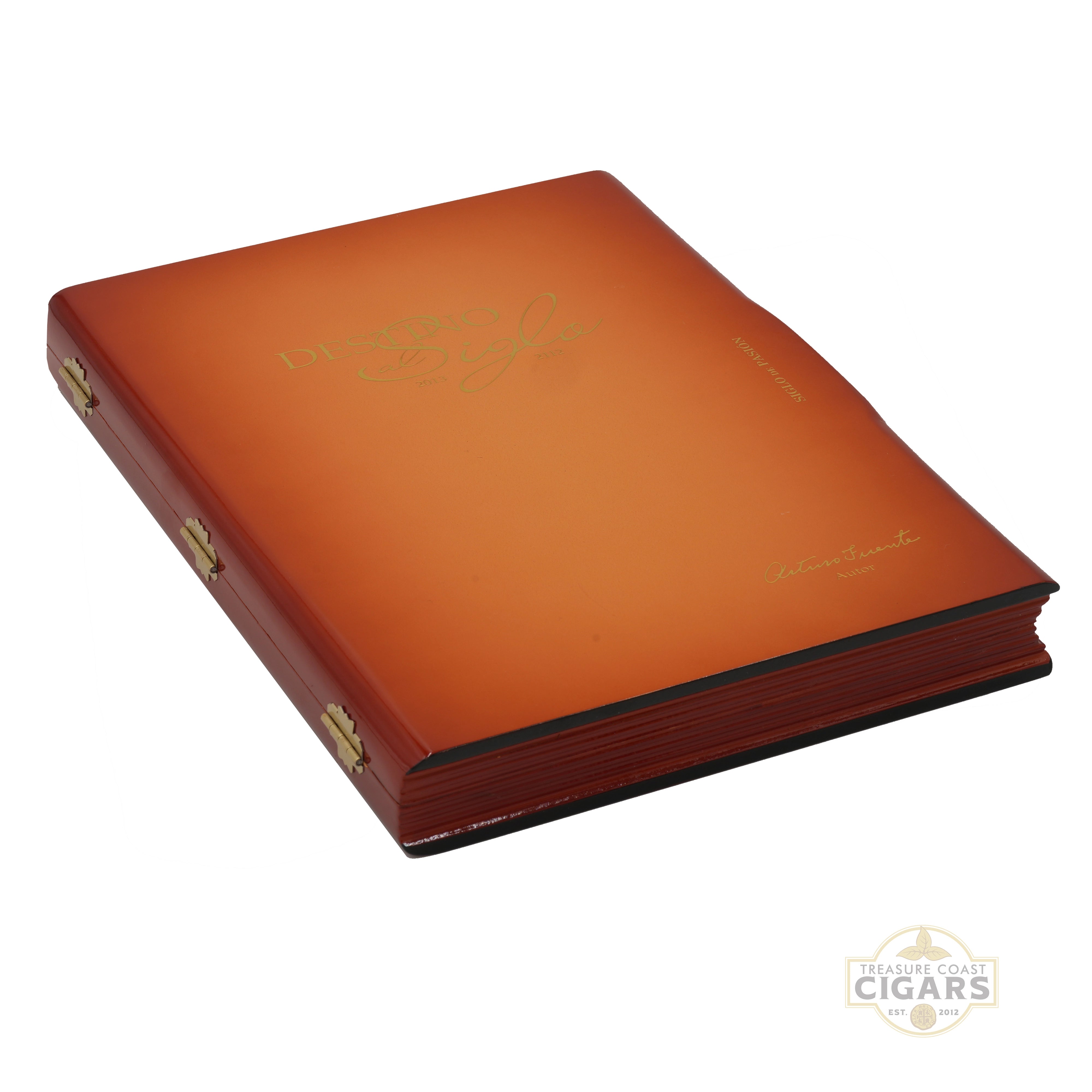 A reddish-brown wooden book style cigar box with gold embossed lettering and brass latches on the side, shown at an angle on a white background.