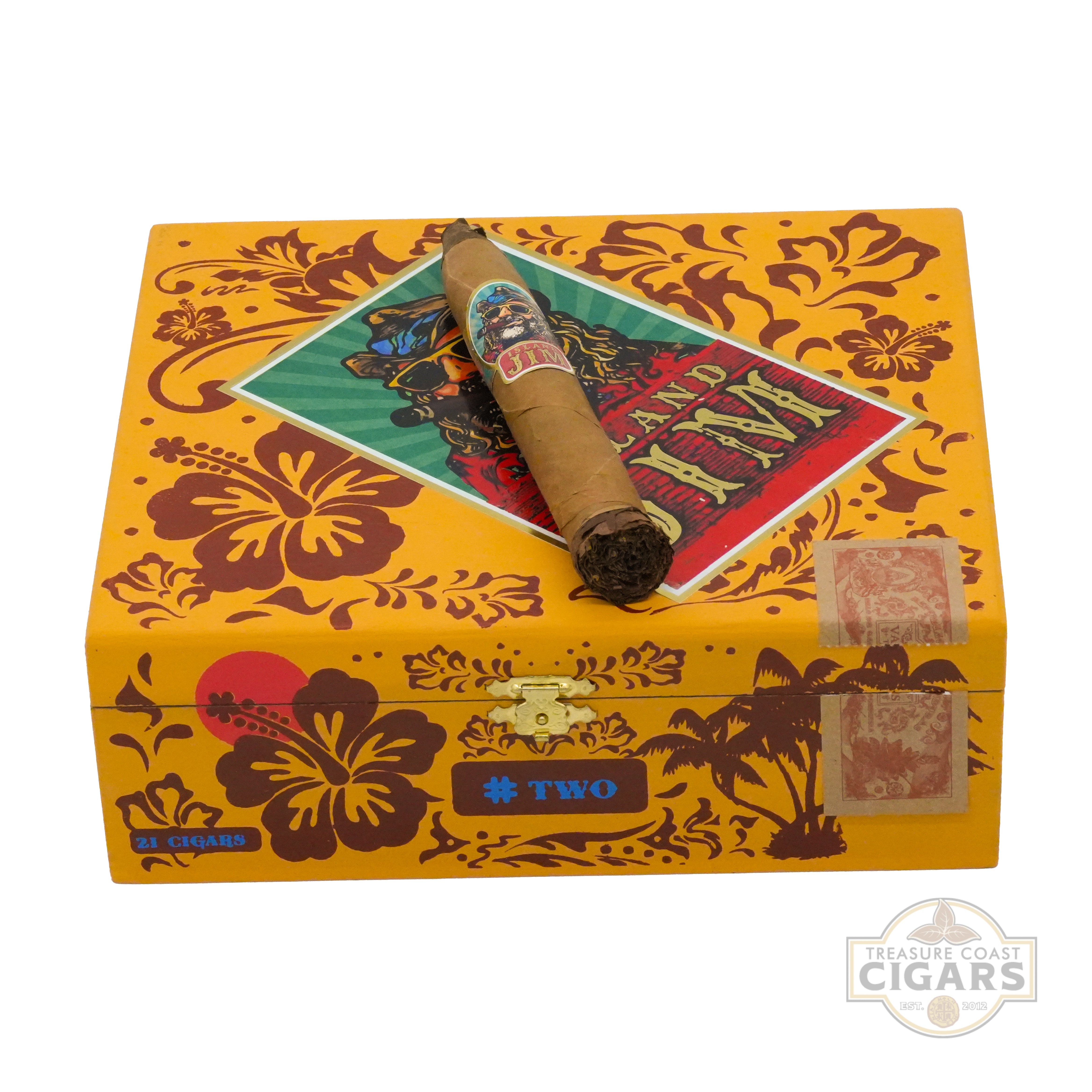 Cigar box with decorative patterns and a cigar on top, featuring the Treasure Coast Cigars brand.