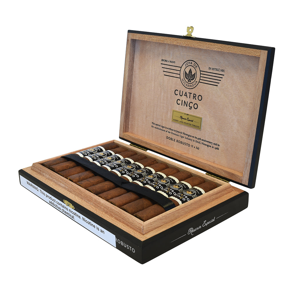 Open wooden Joya de Nicaragua Cuatro Cinco Doble Robusto with cigars and branded lid on a white background