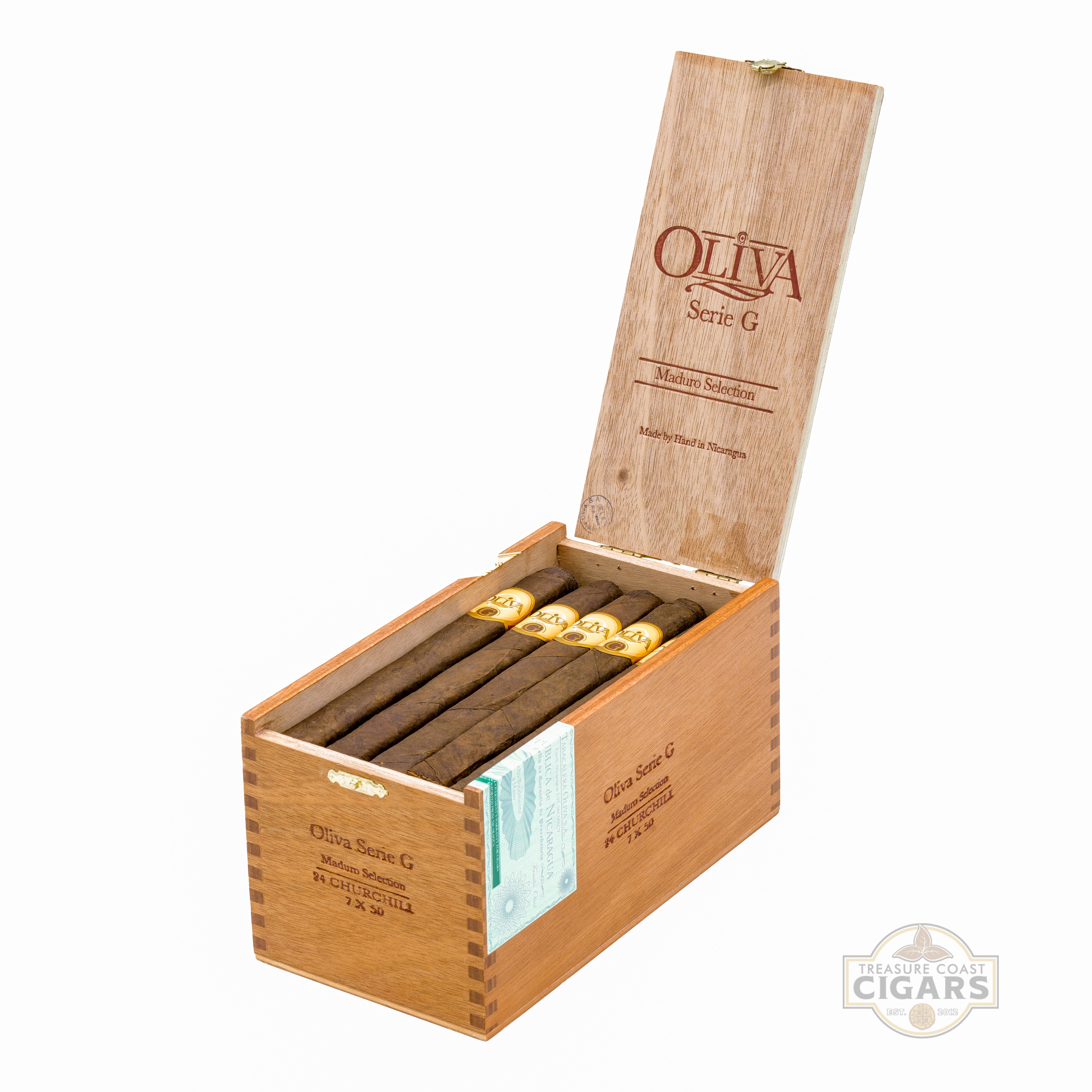Open wooden box of Oliva Series G cigars on a white background