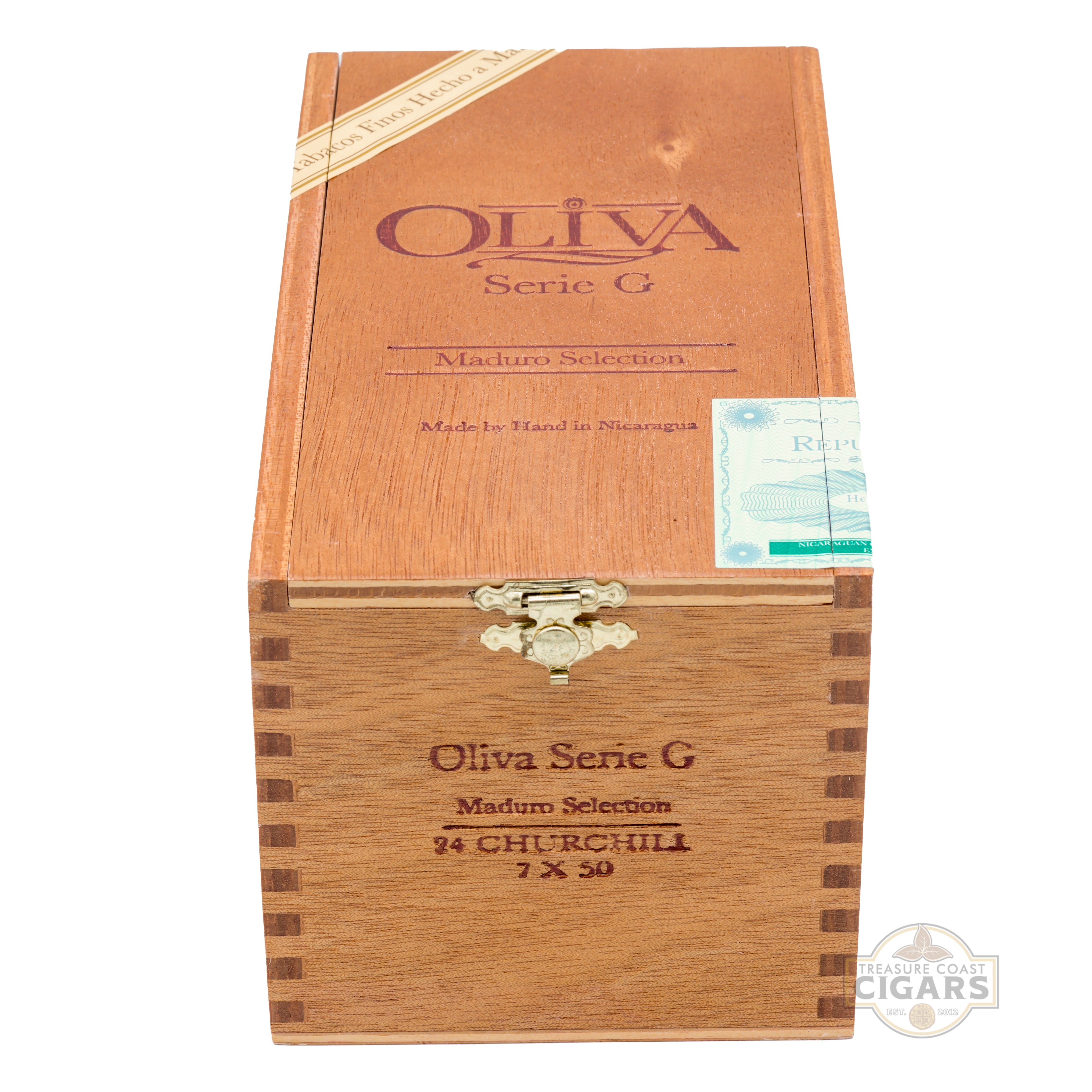 Wooden box of Oliva Serie G cigars on a white background
