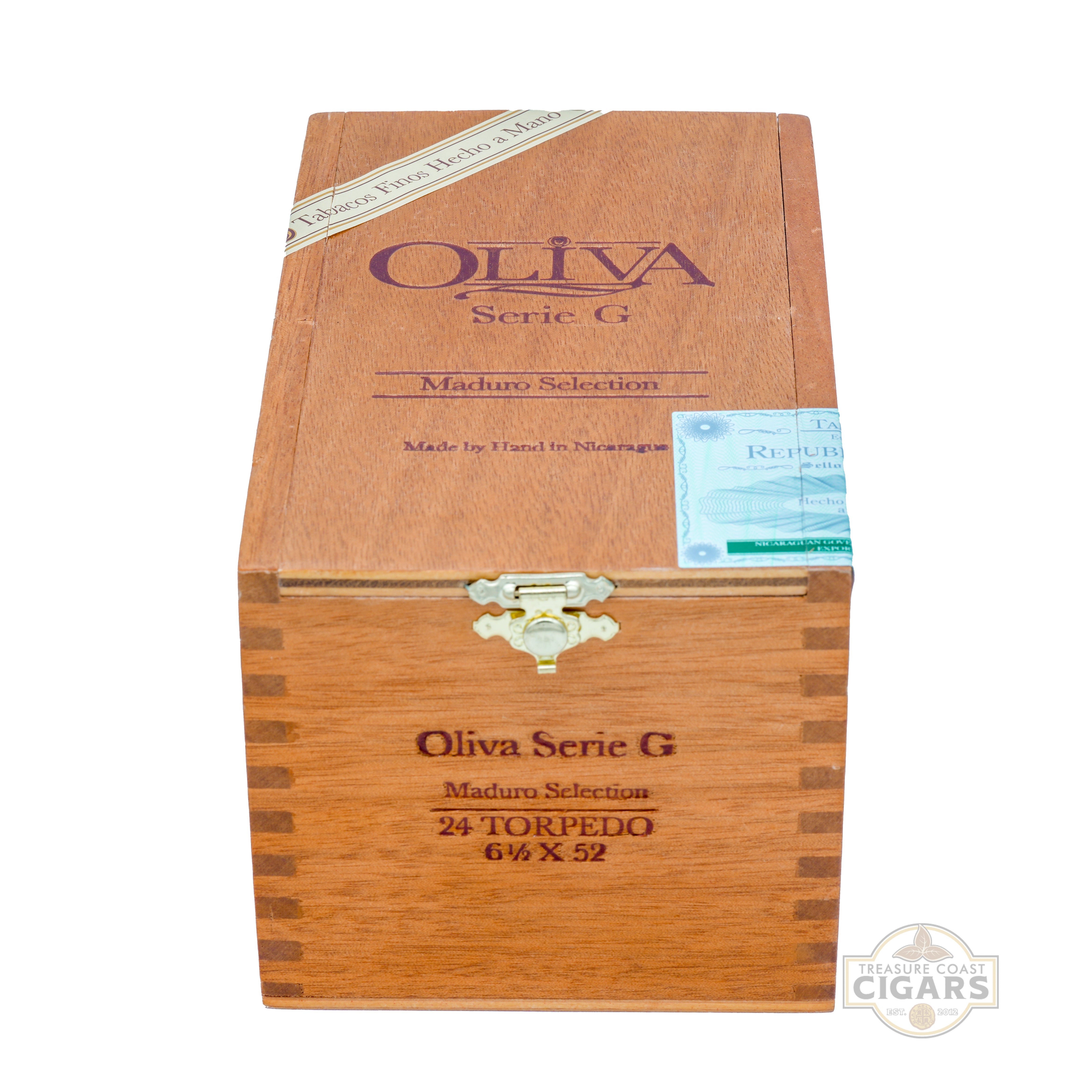 Wooden box of Oliva Serie G cigars on a white background