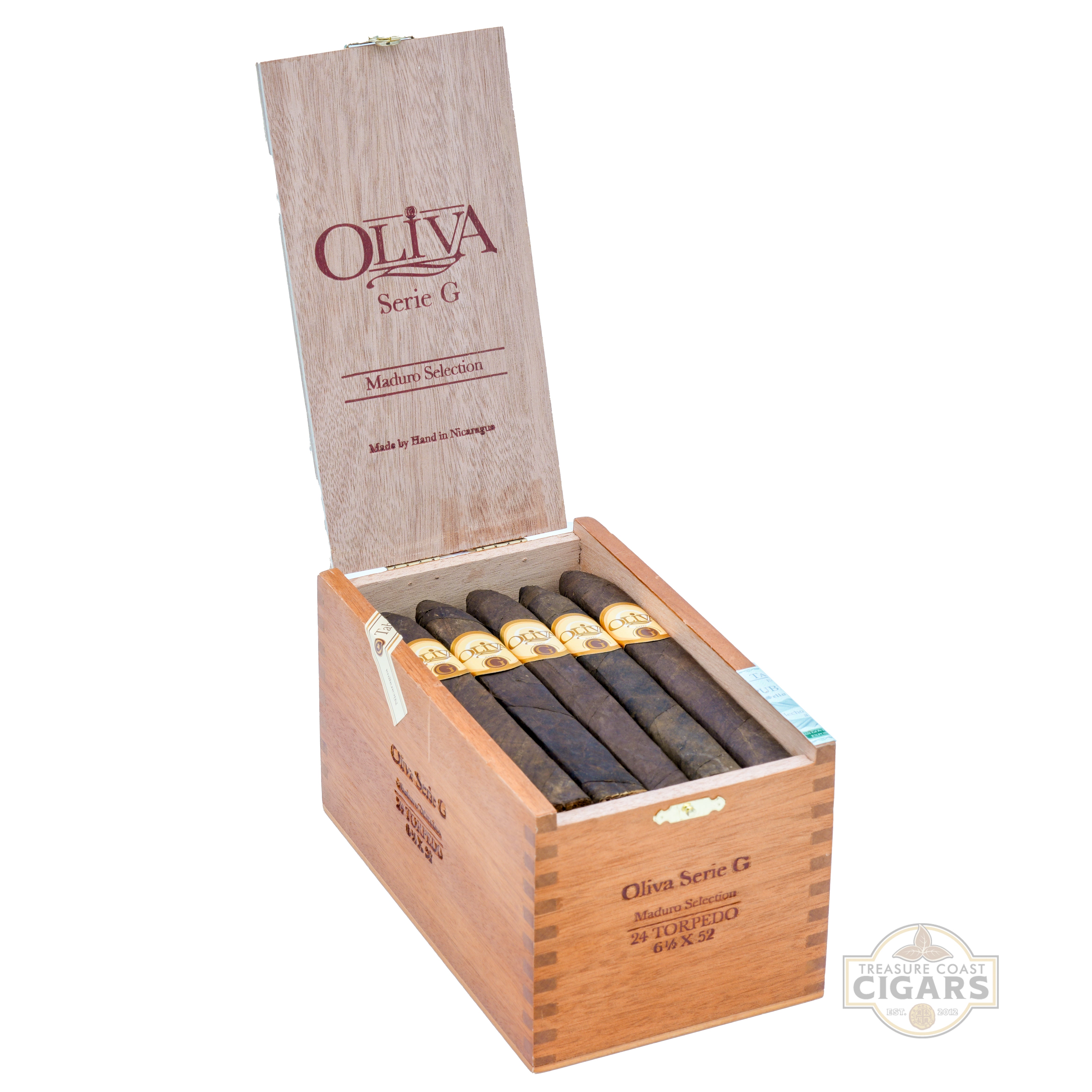 Open wooden box of Oliva Serie G cigars on a white background