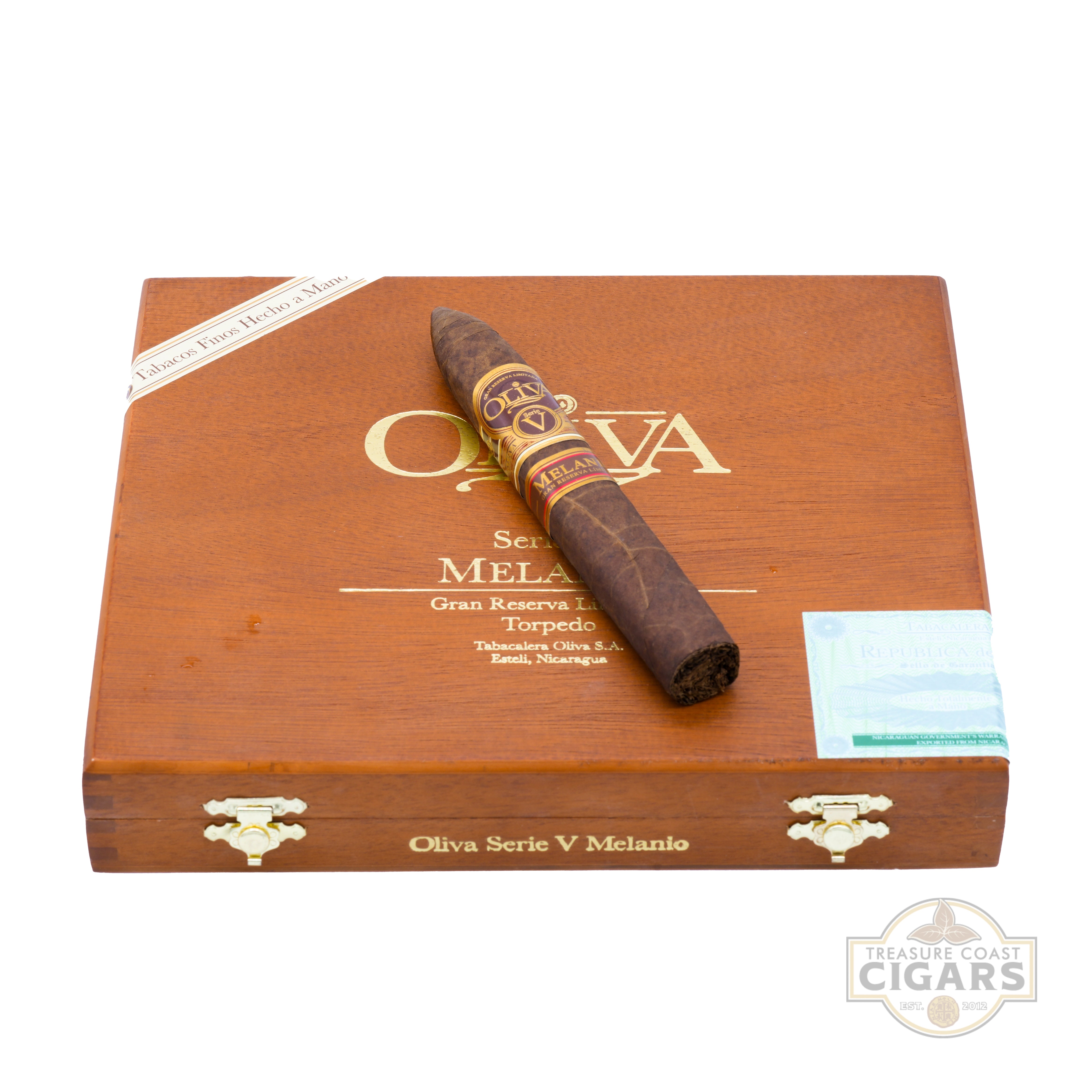 Melanio Cigar box with a cigar on top, featuring the Oliva brand on a white background.