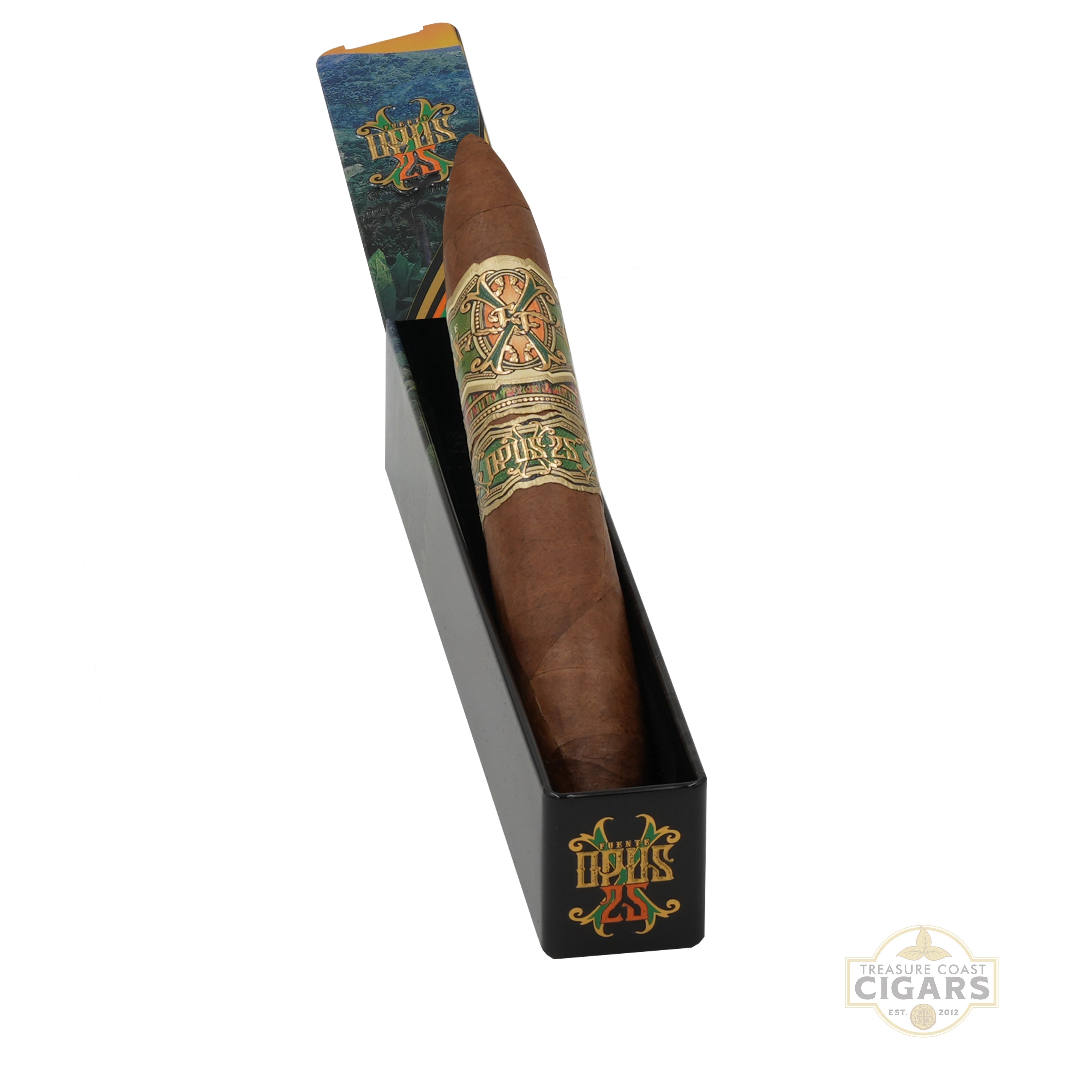 A single brown cigar in a black coffin box with a decorative header and a prominent gold, green, and red band. The brand name 'OPUS25' is visible on both the packaging and the band.