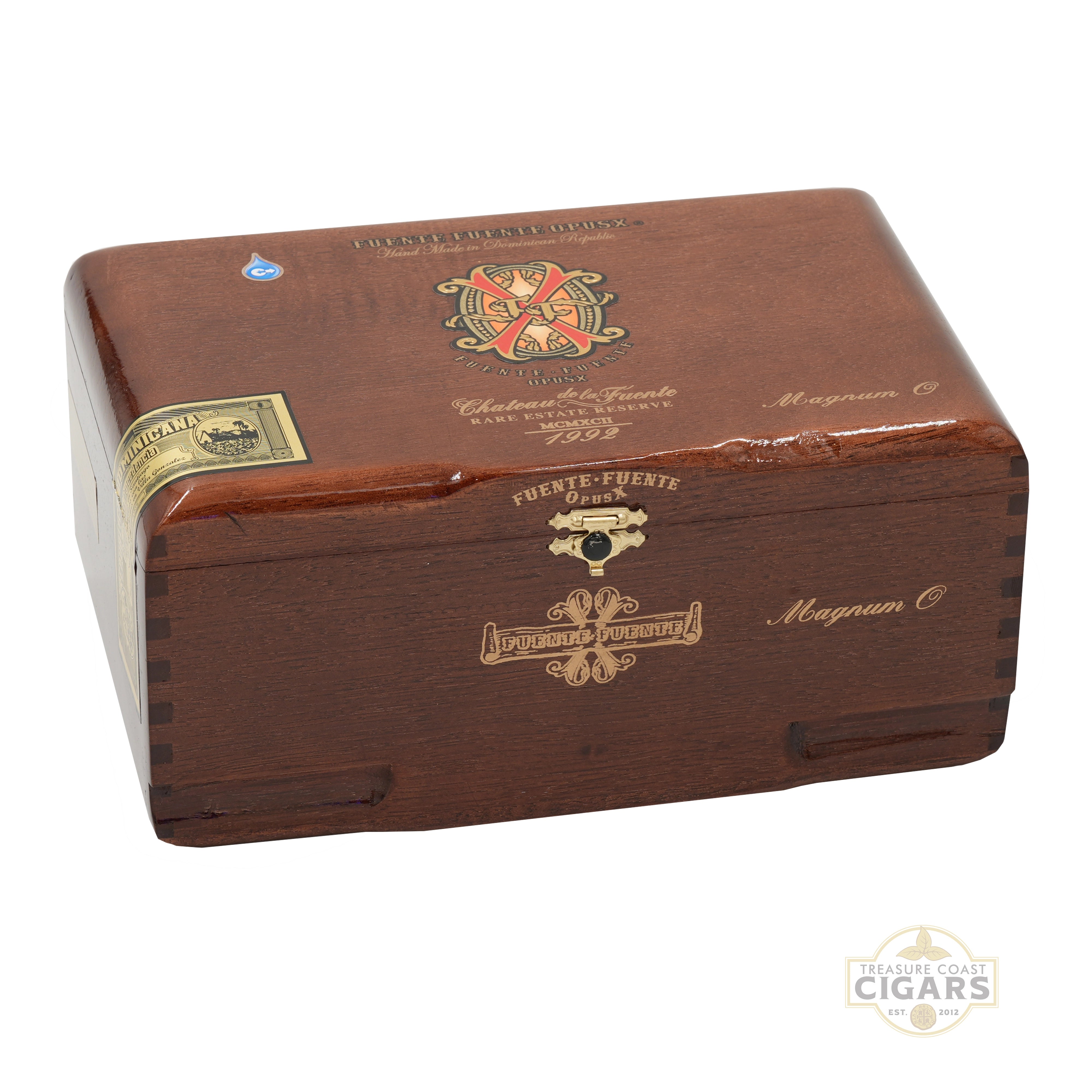 A premium wood cigar box made of rich brown wood with gold-toned engravings and seals, shown on a white background with a 'Treasure Coast Cigars' watermark in the corner.