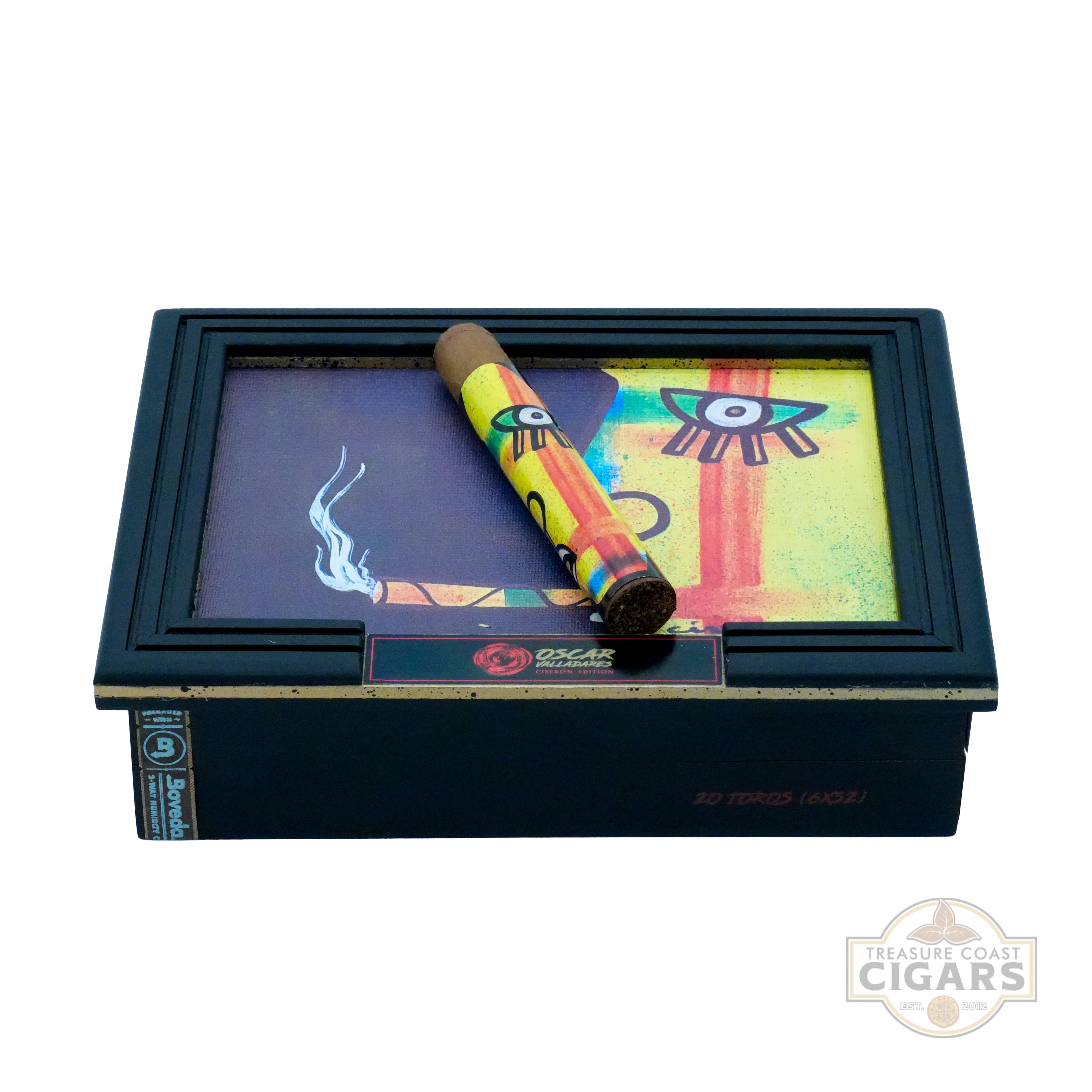 Cigar in a decorative humidor with colorful design on a white background