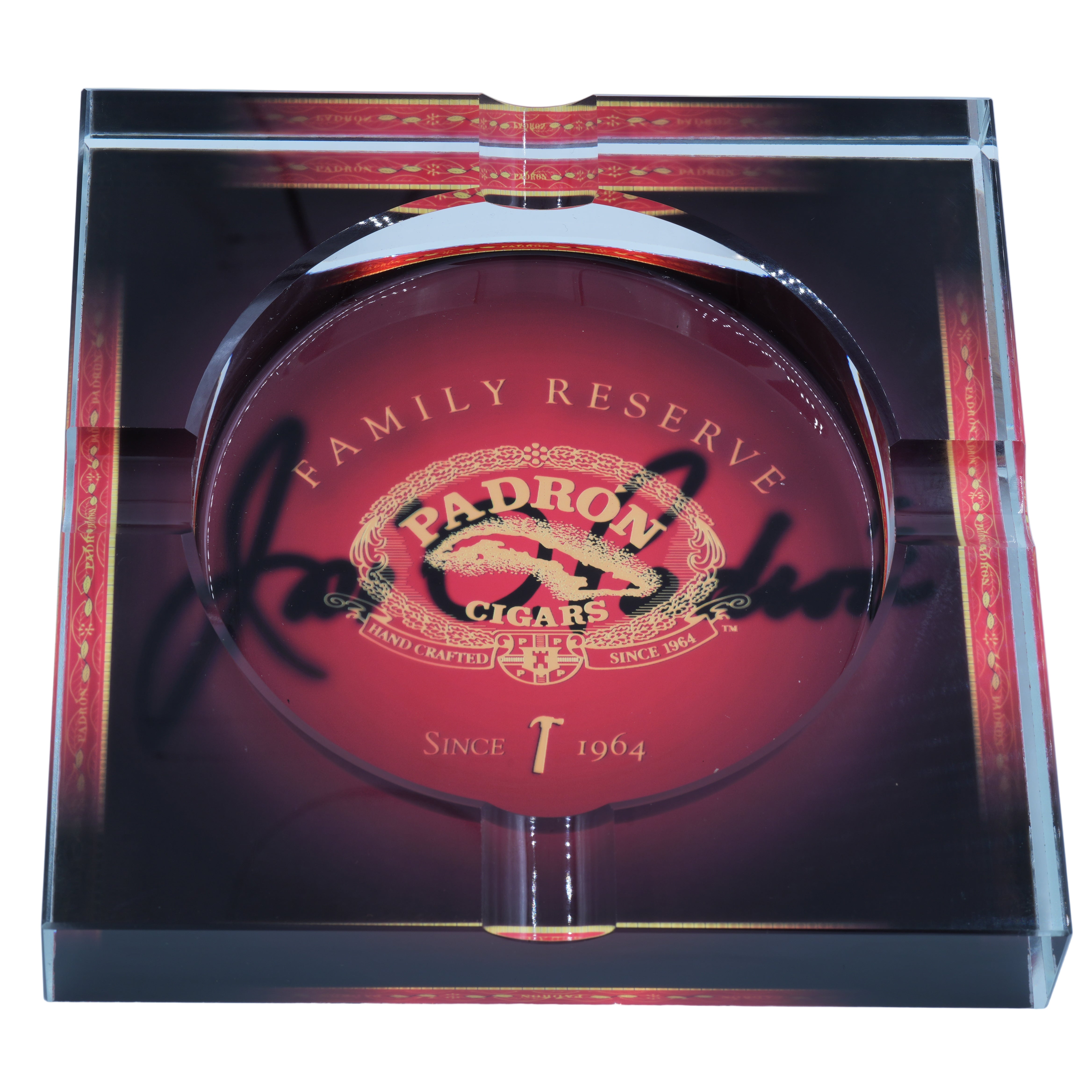 Padron Family Reserve cigars in a clear display case on a light white background