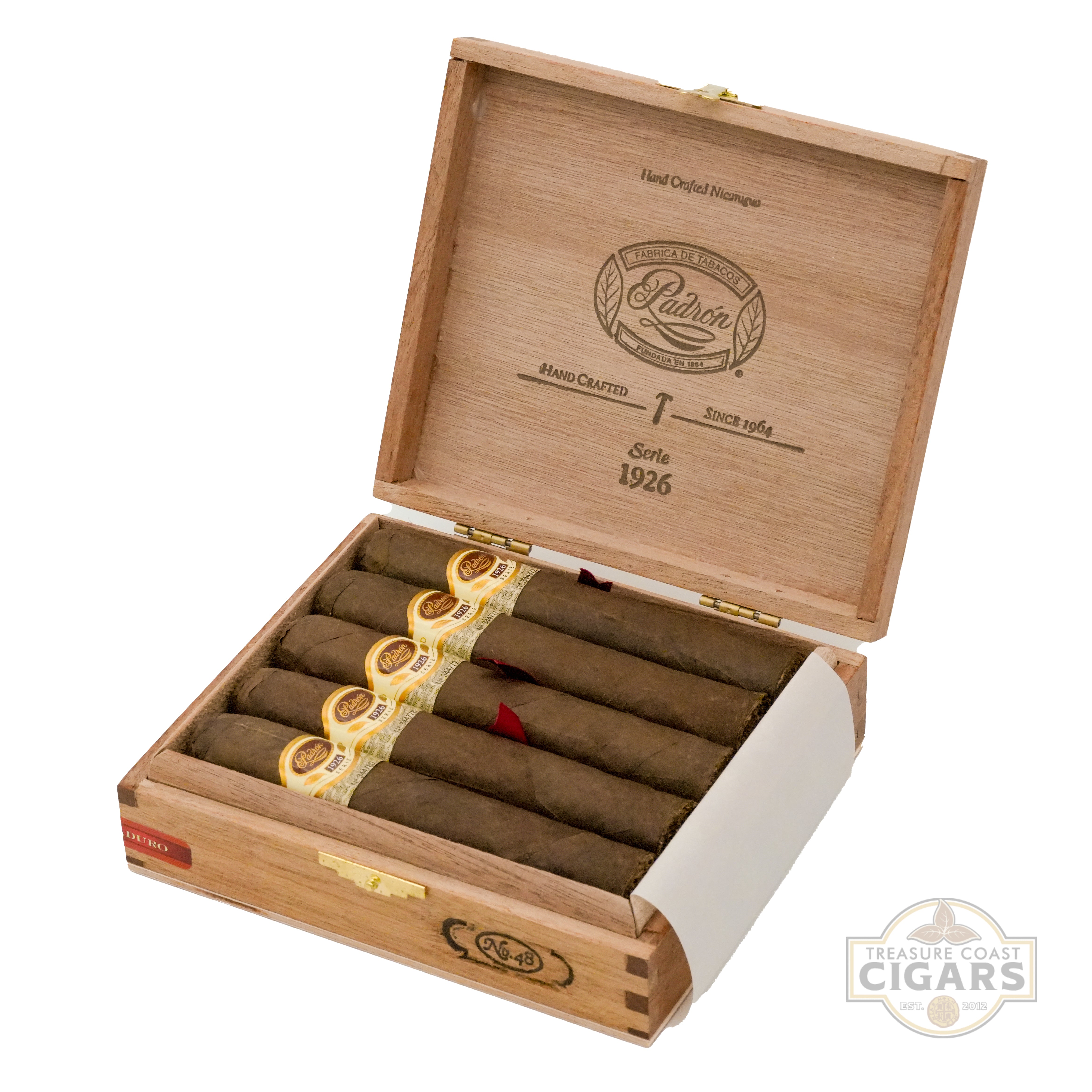 Open wooden cigar box with cigars inside, featuring Patrén logo.