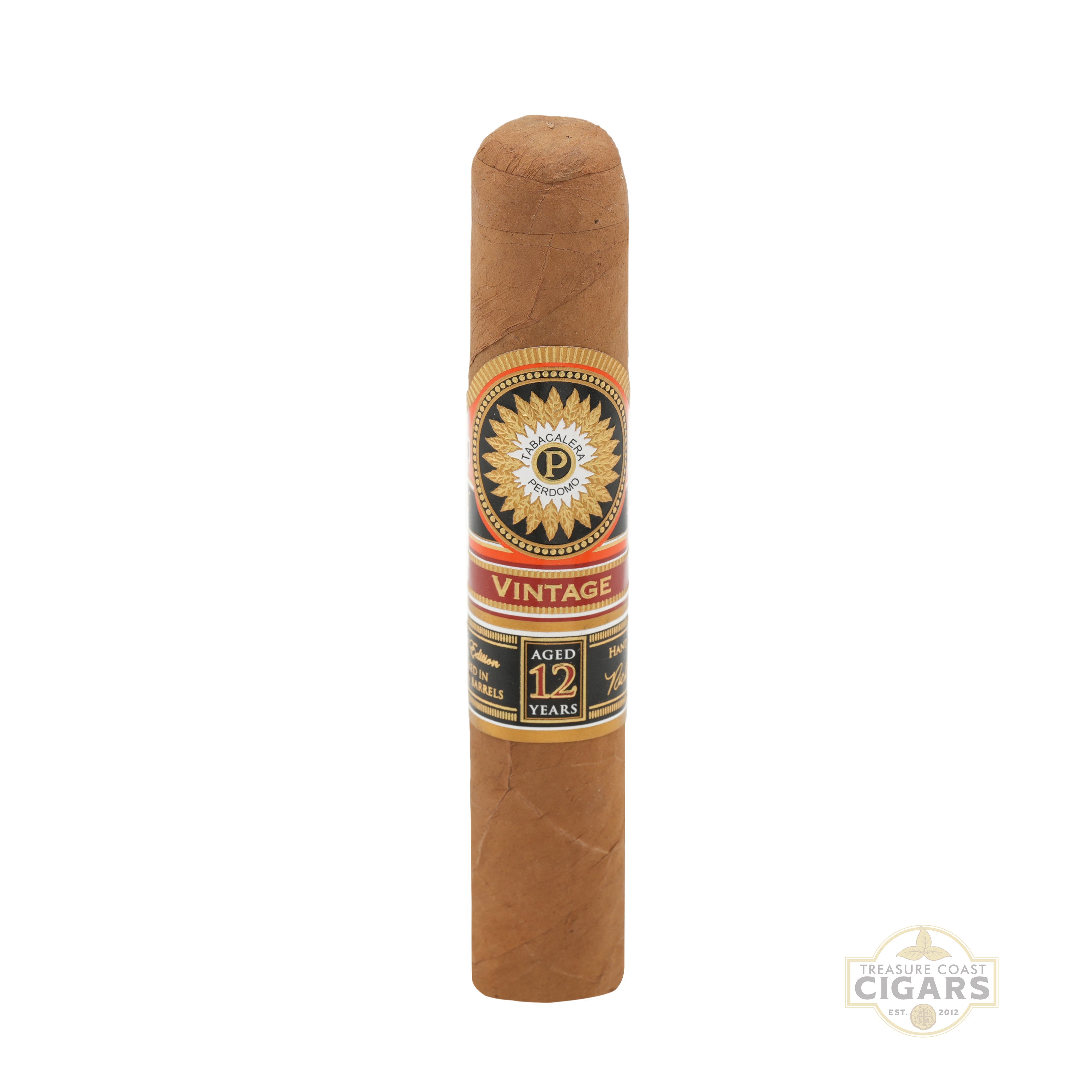 Cigar with ornate band on a white background