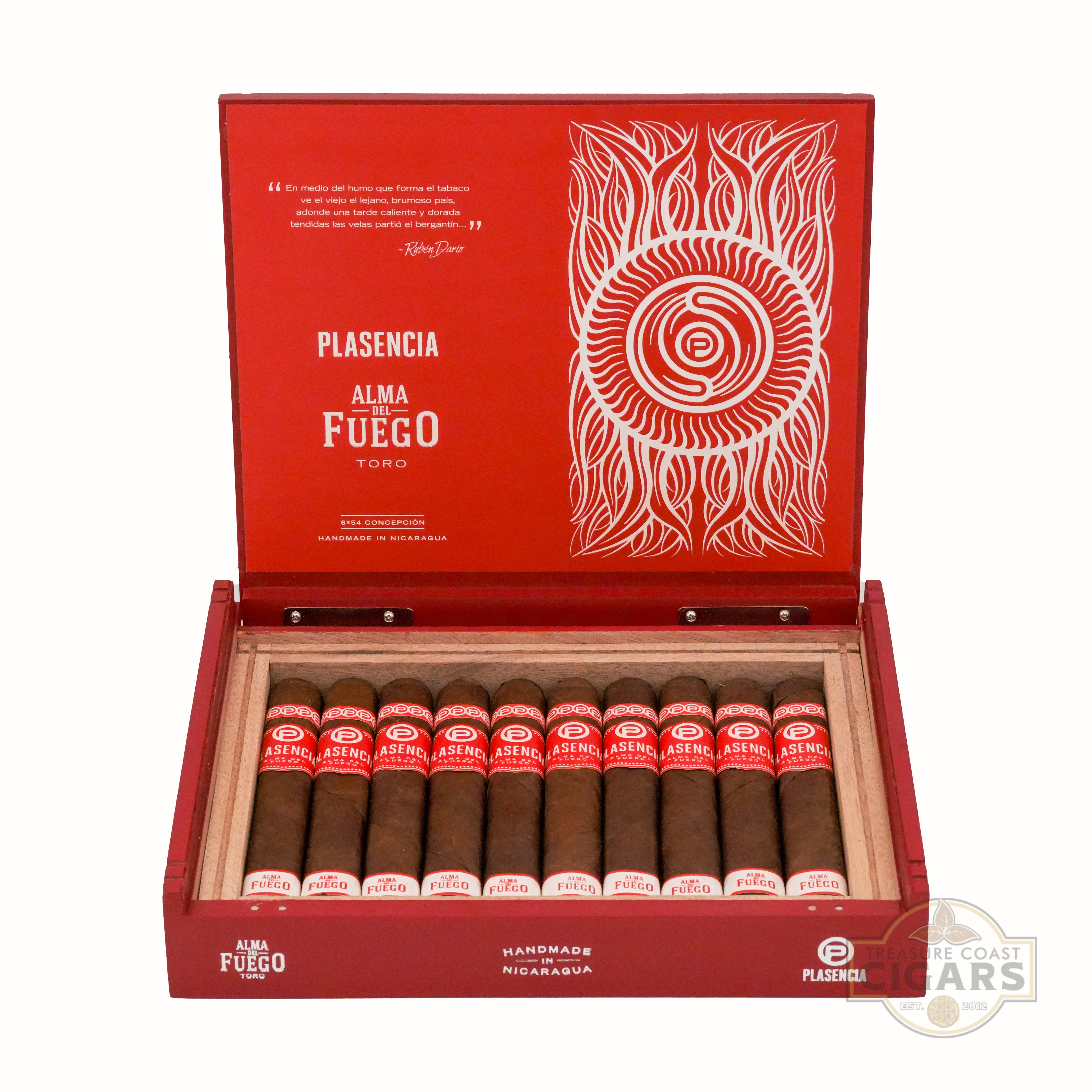 An open red wooden cigar box labeled "Plasencia Alma Del Fuego Toro" on the lid and front, featuring an intricate white design with a sunburst pattern and stylized flames. The lid includes a quote from Nicaraguan poet, Ruben Dario, and  "Handmade in Nicaragua." Inside, the box contains ten dark brown cigars with red and white bands labeled "Plasencia" and "Alma Del Fuego." 