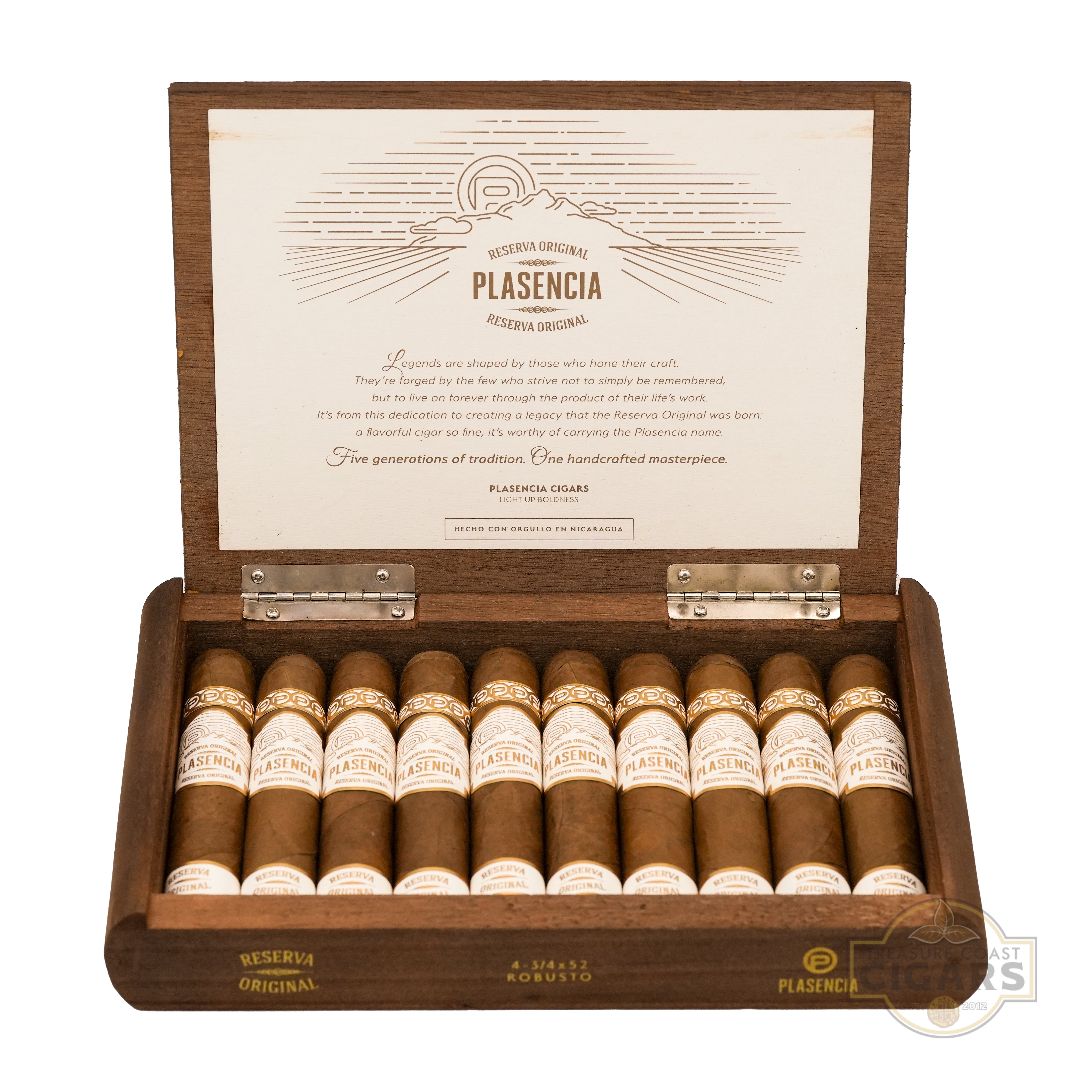 A wooden cigar box with the lid open, revealing a row  of premium cigars labeled "Plasencia Reserva Original." The interior lid features an elegant design with the text "Plasencia Reserva Original" and a description highlighting five generations of tradition and handcrafted mastery. The cigars are neatly arranged, each wrapped in white and gold bands with "Plasencia" branding. The box has a rustic, quality finish with metallic hinges. 