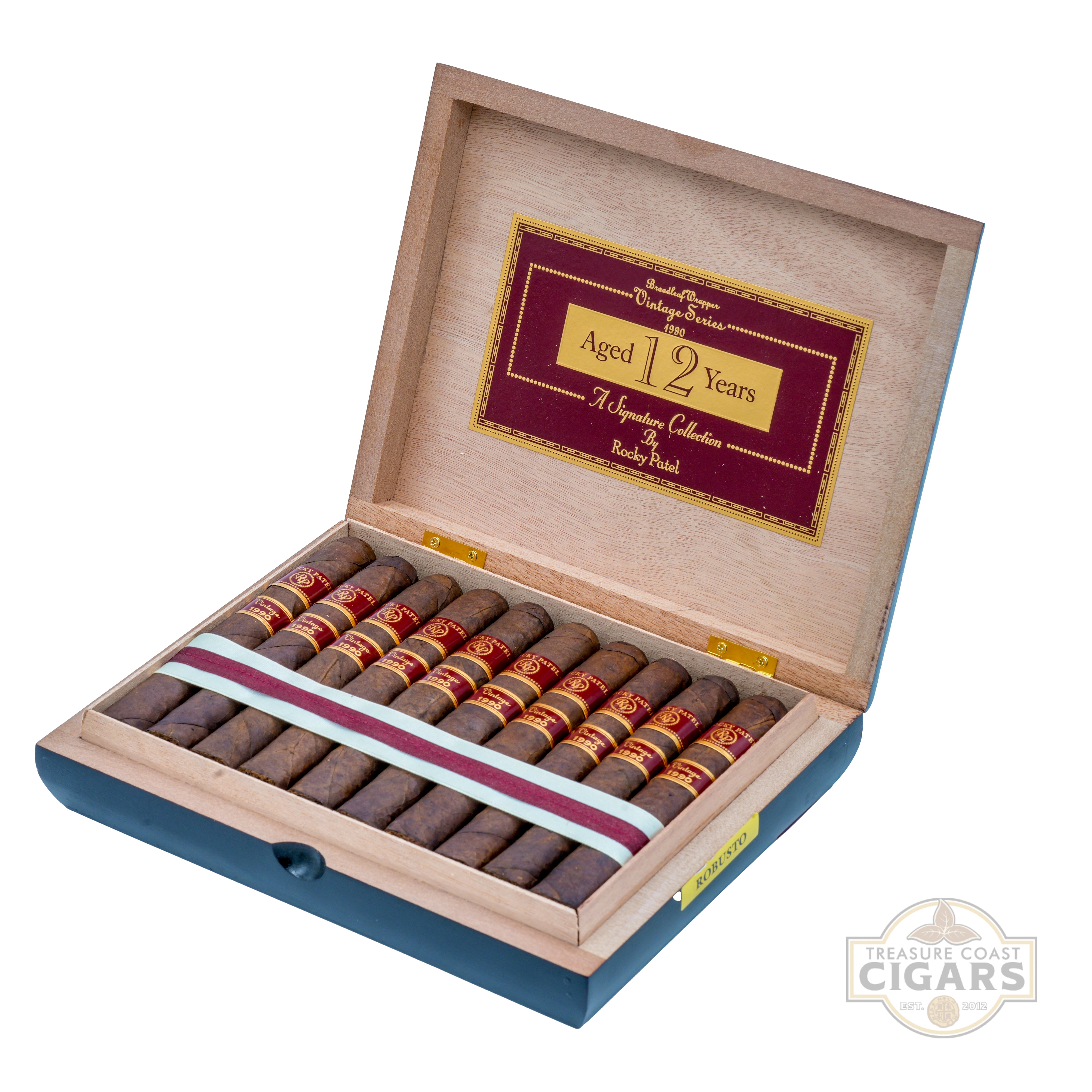 Open wooden box of cigars with a label indicating 'Aged 12 Years' on a white background.